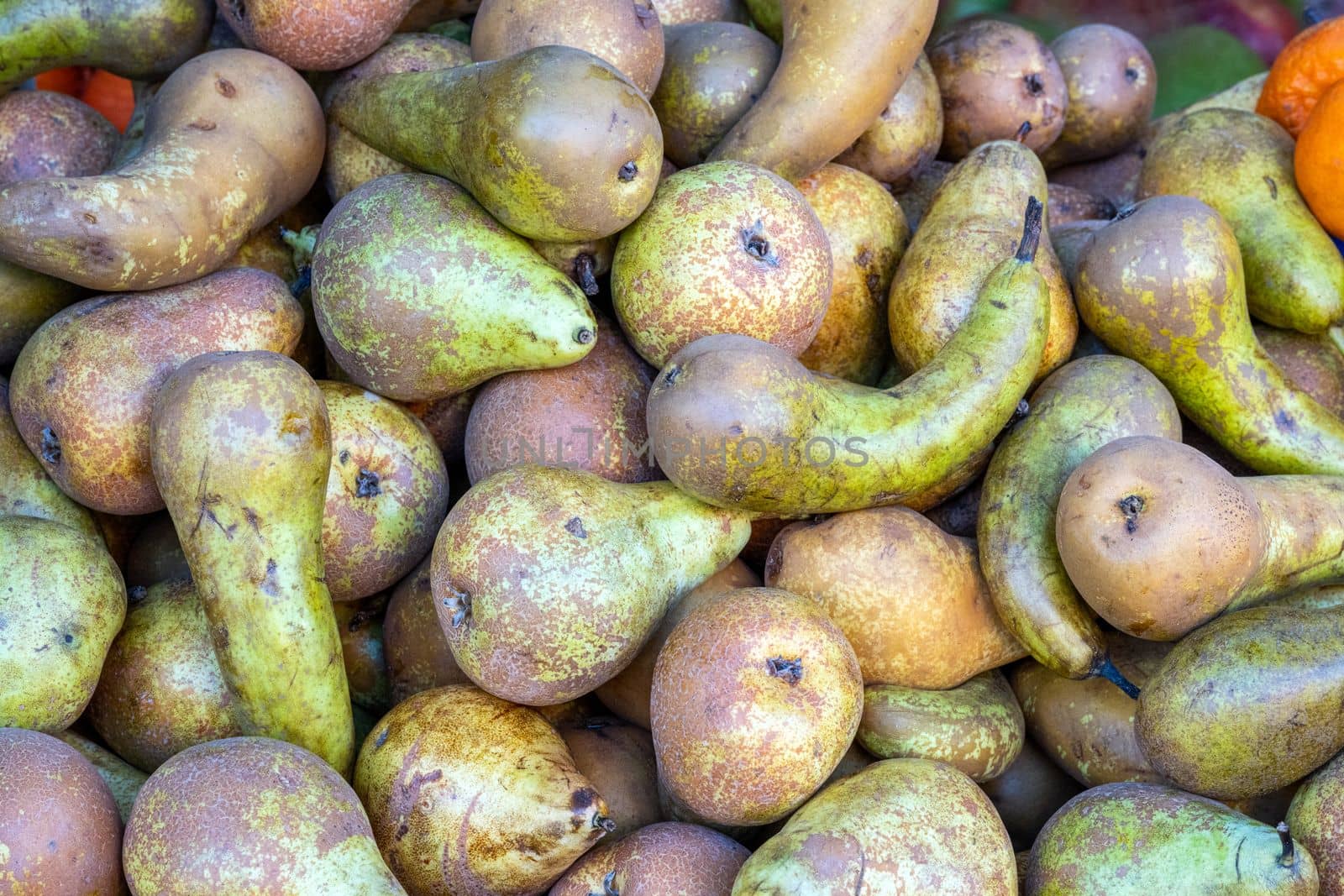 Green pears for sale at a a market