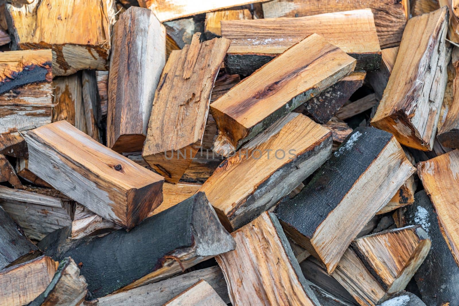 pile of wood for heating in the fireplace. High quality photo