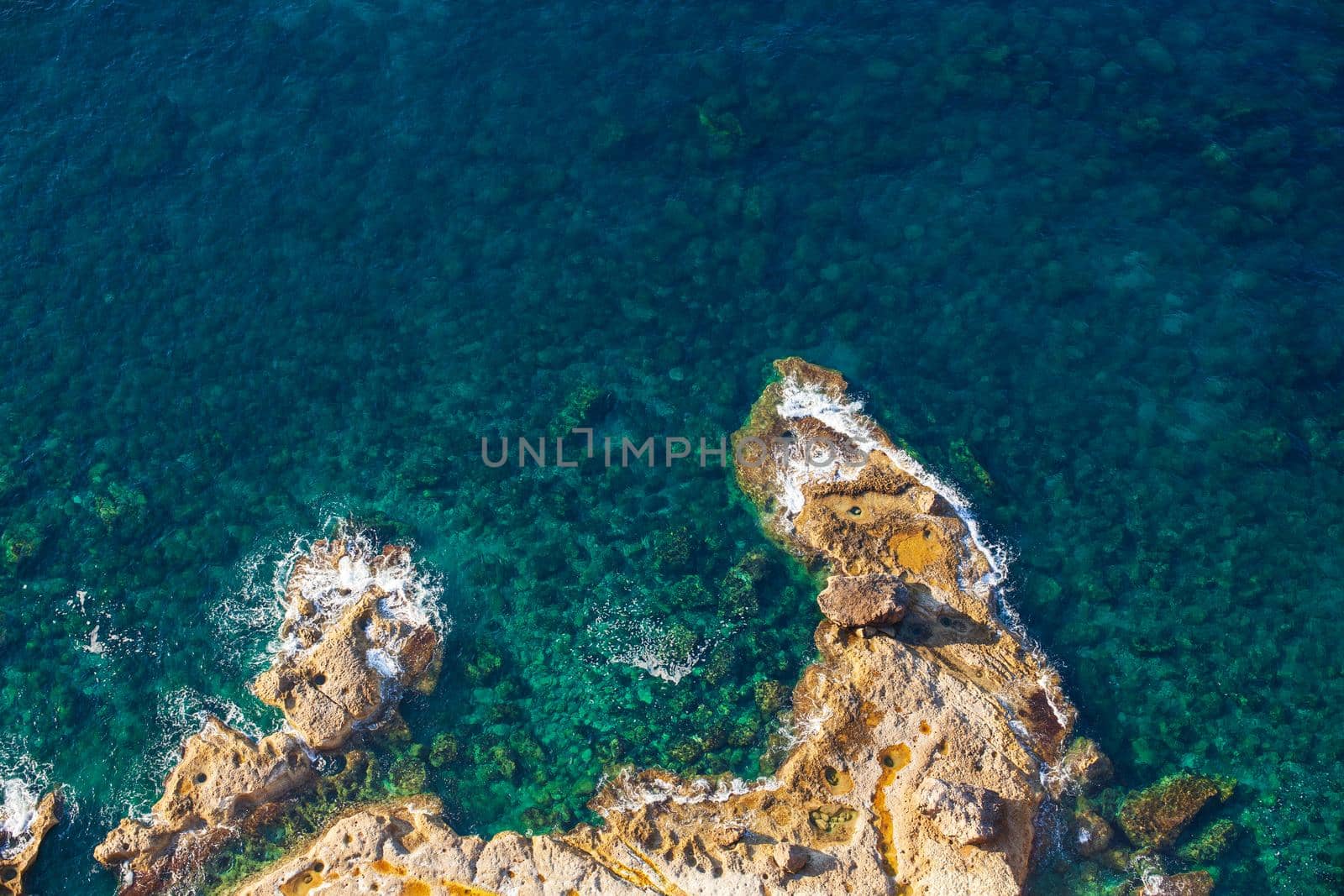 View of the waves on the rock in Lampedusa, Sicily