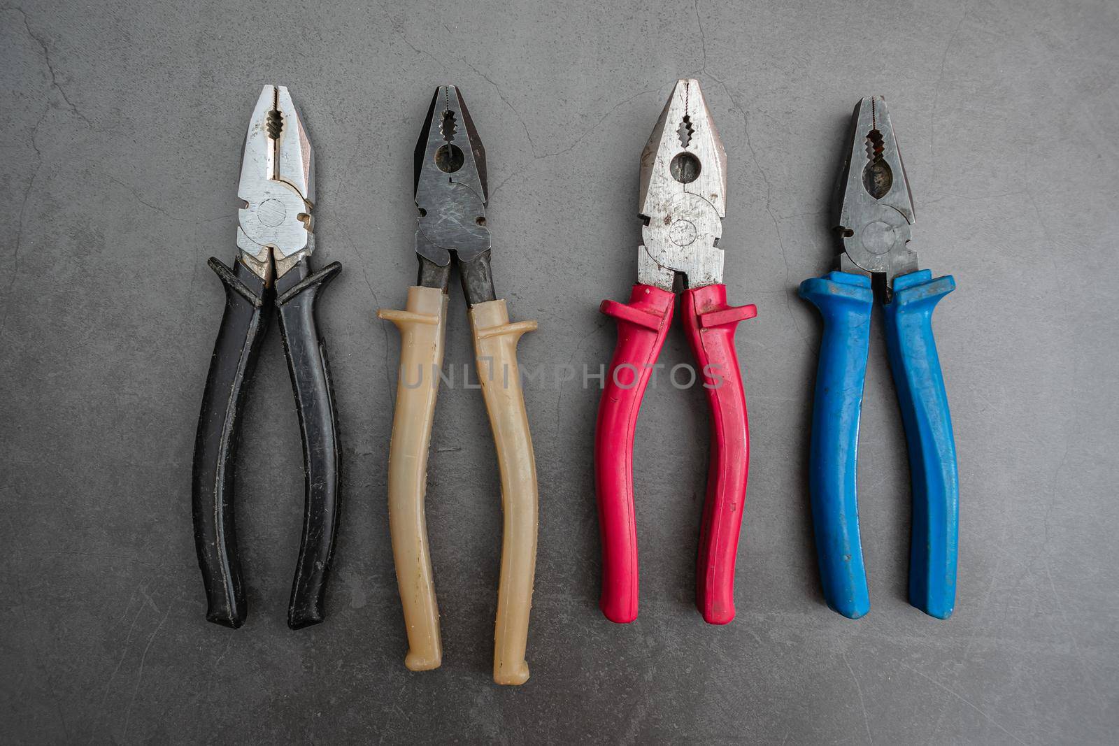 Professional set of pliers in various sizes and calibers for home renovation or construction work