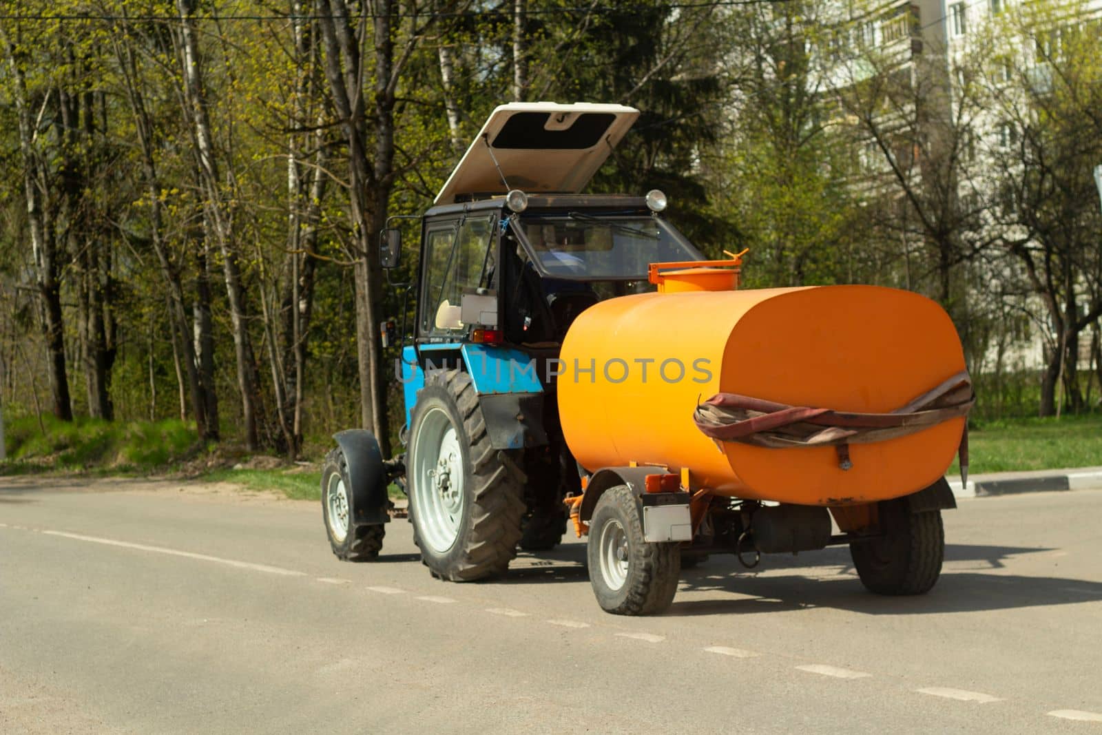 Transportation of water. Street cleaning. by OlegKopyov