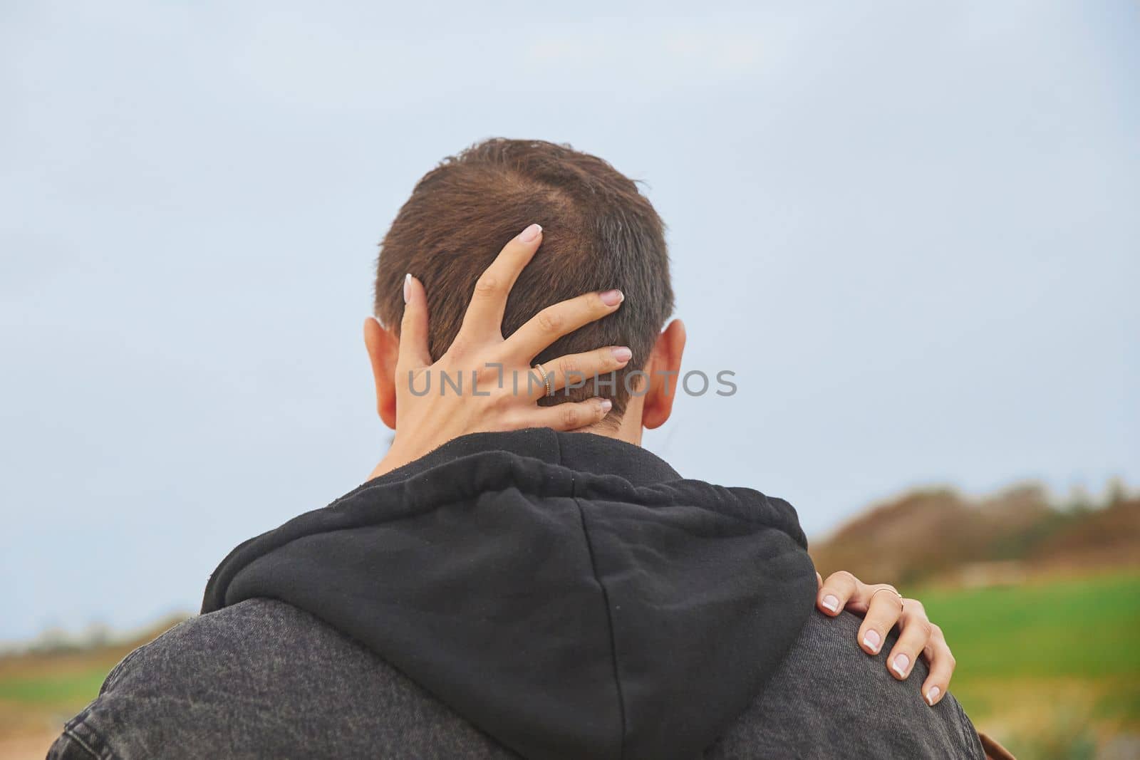 Newlyweds kissing on the beach in Denmark by Viktor_Osypenko