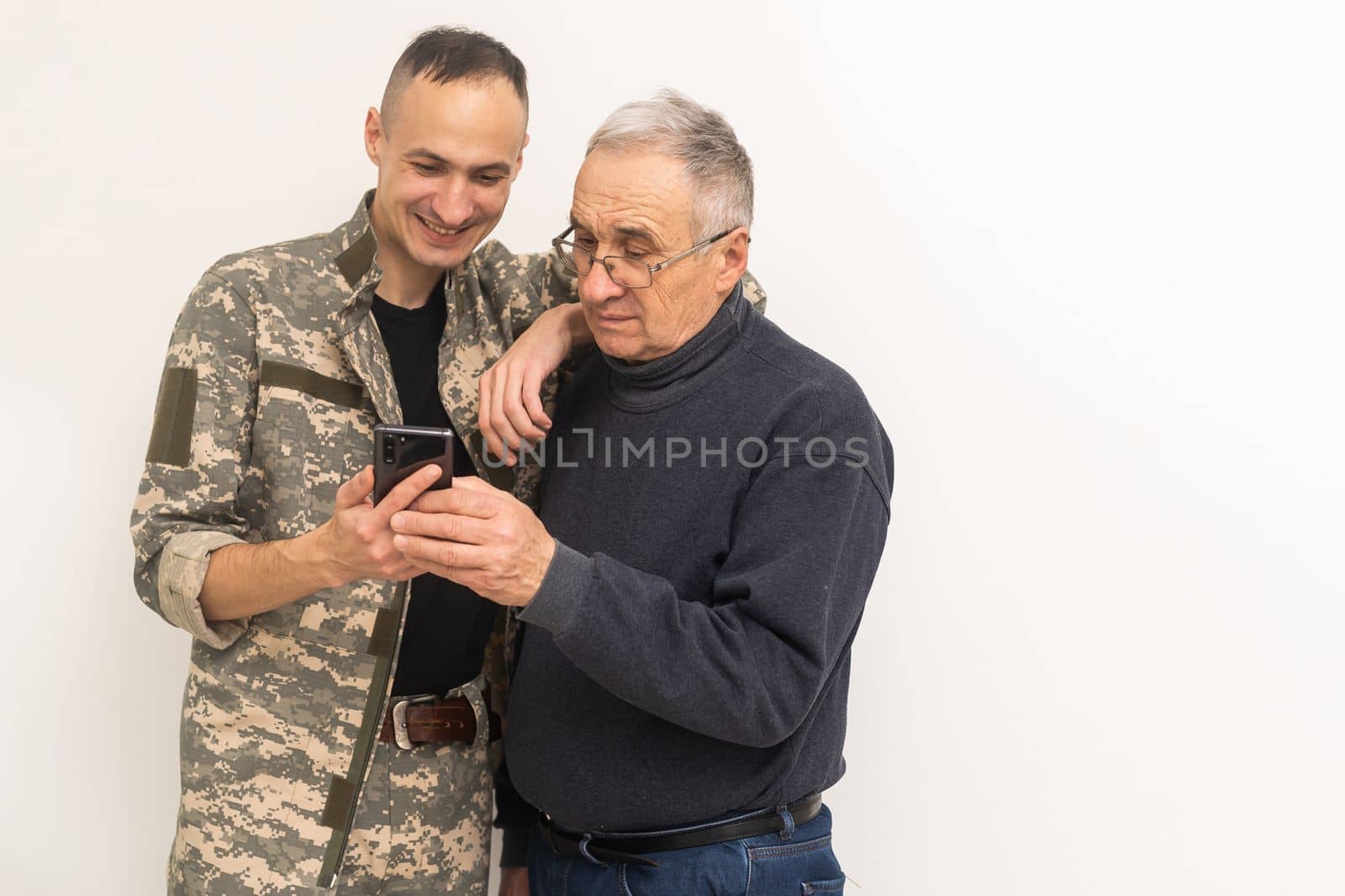 an elderly father and a military son.