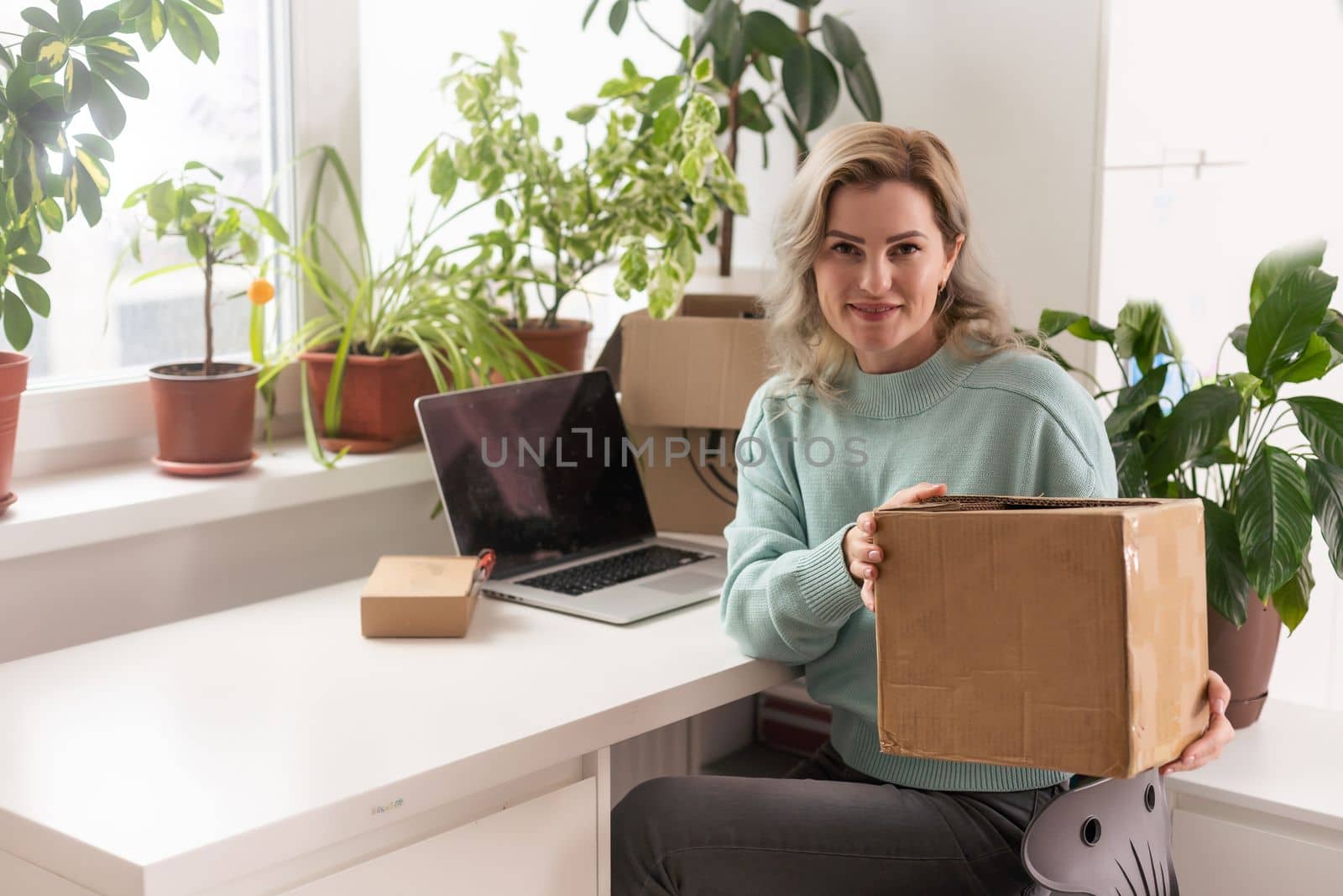 Small start-up business owners are packing boxes. To deliver to customers, salespeople, check production orders. Pack products, send to customers, sell ecommerce delivery ideas by Andelov13