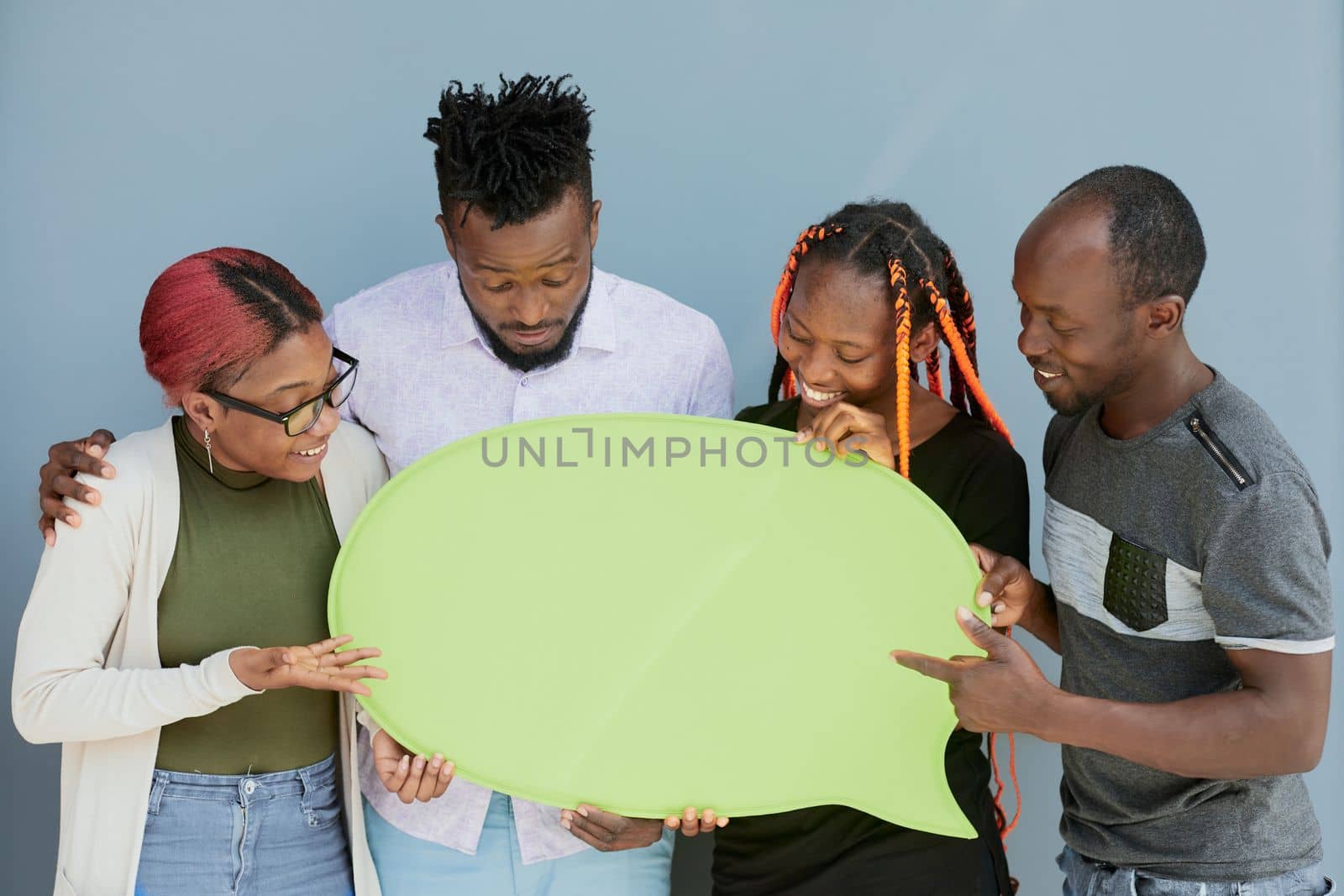 Young african american friends holding up copyspace placard thought bubbles by Prosto