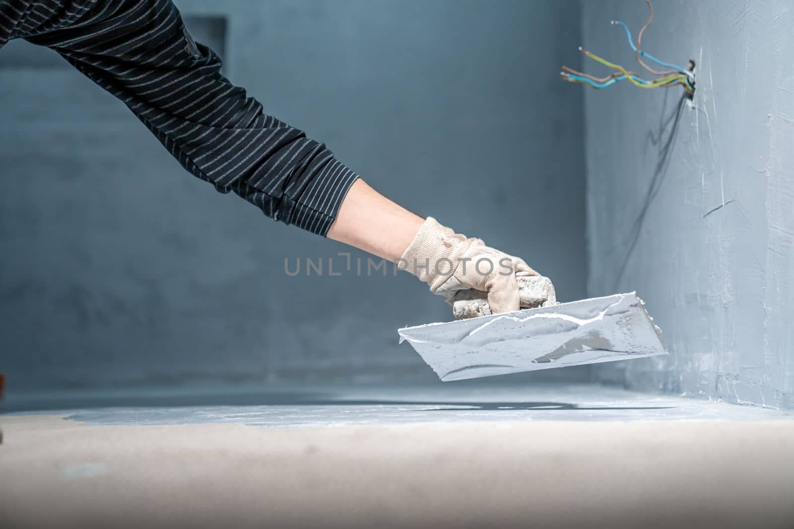 waterproofing of the bathroom floor in a new building.