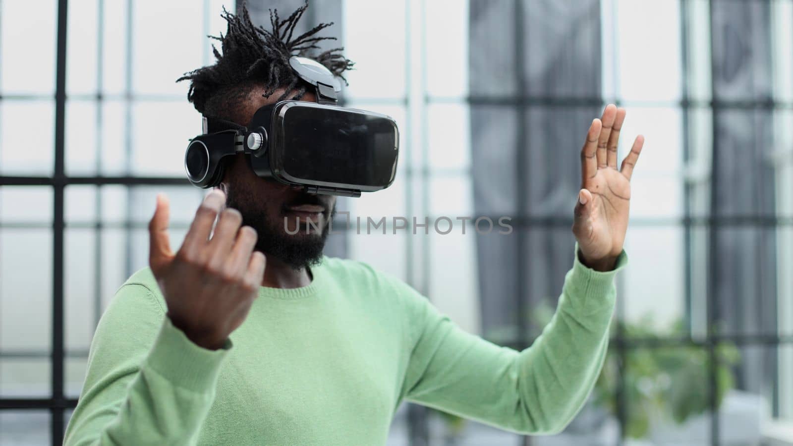A man is looking for bright impressions using gadgets.