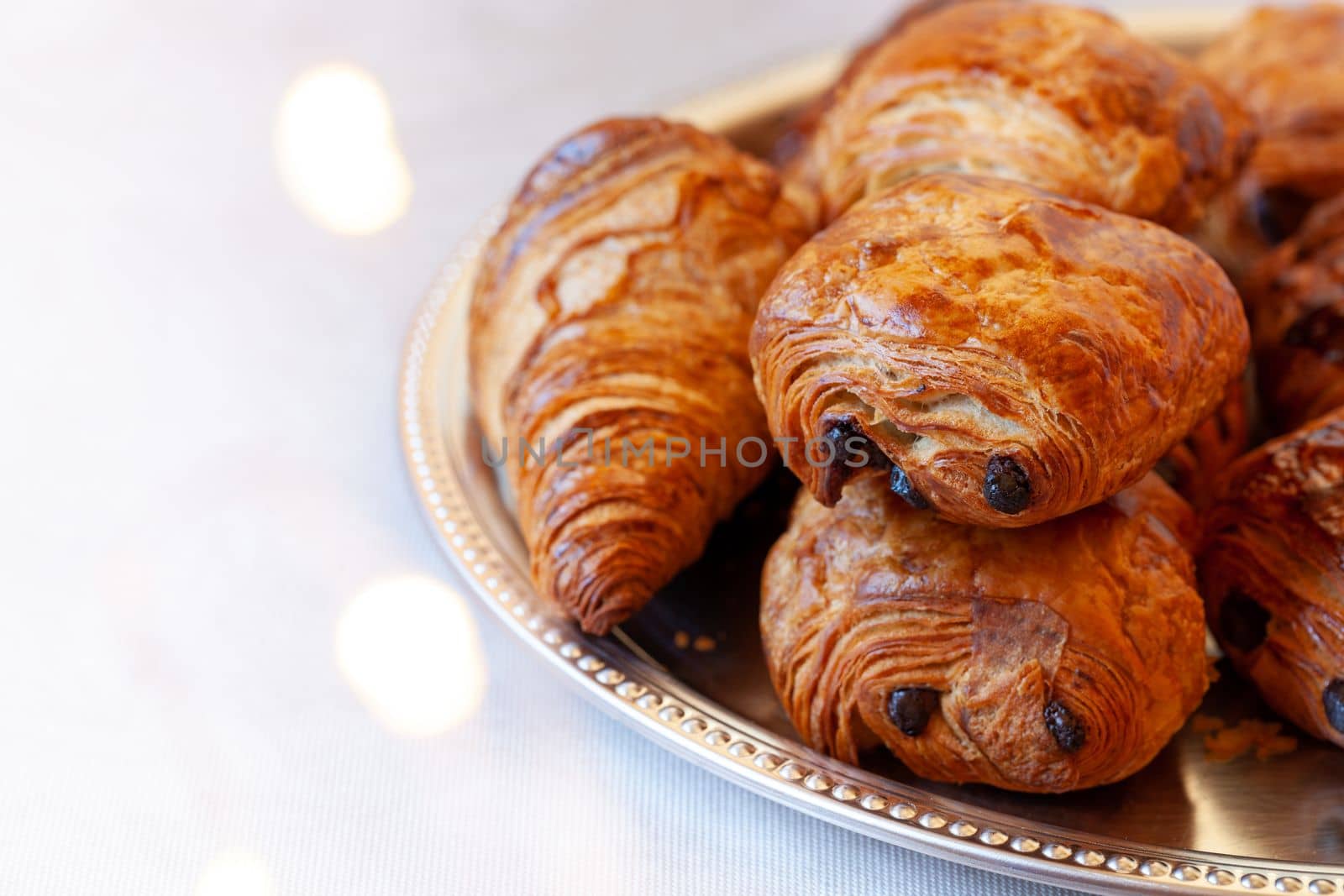 pain au chocolat, french sweet pastry speciality, side view, selective focus