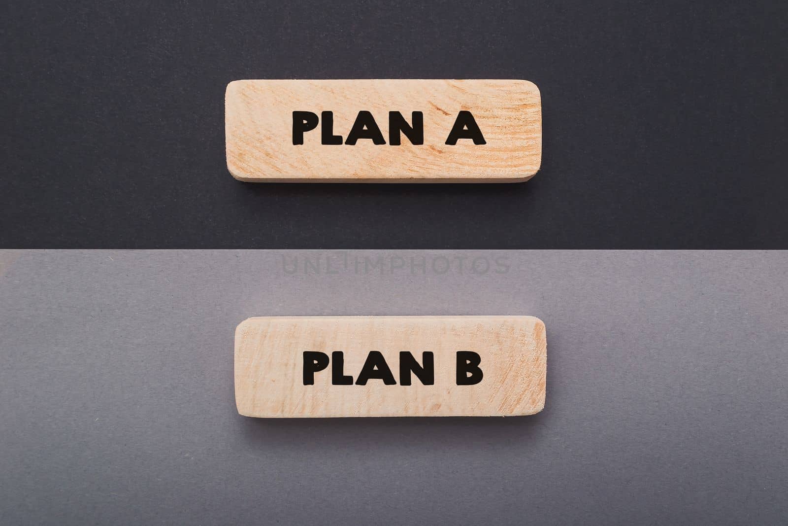 Phrases Plan A and Plan B on miniature tablets upper view by Alla_Morozova93