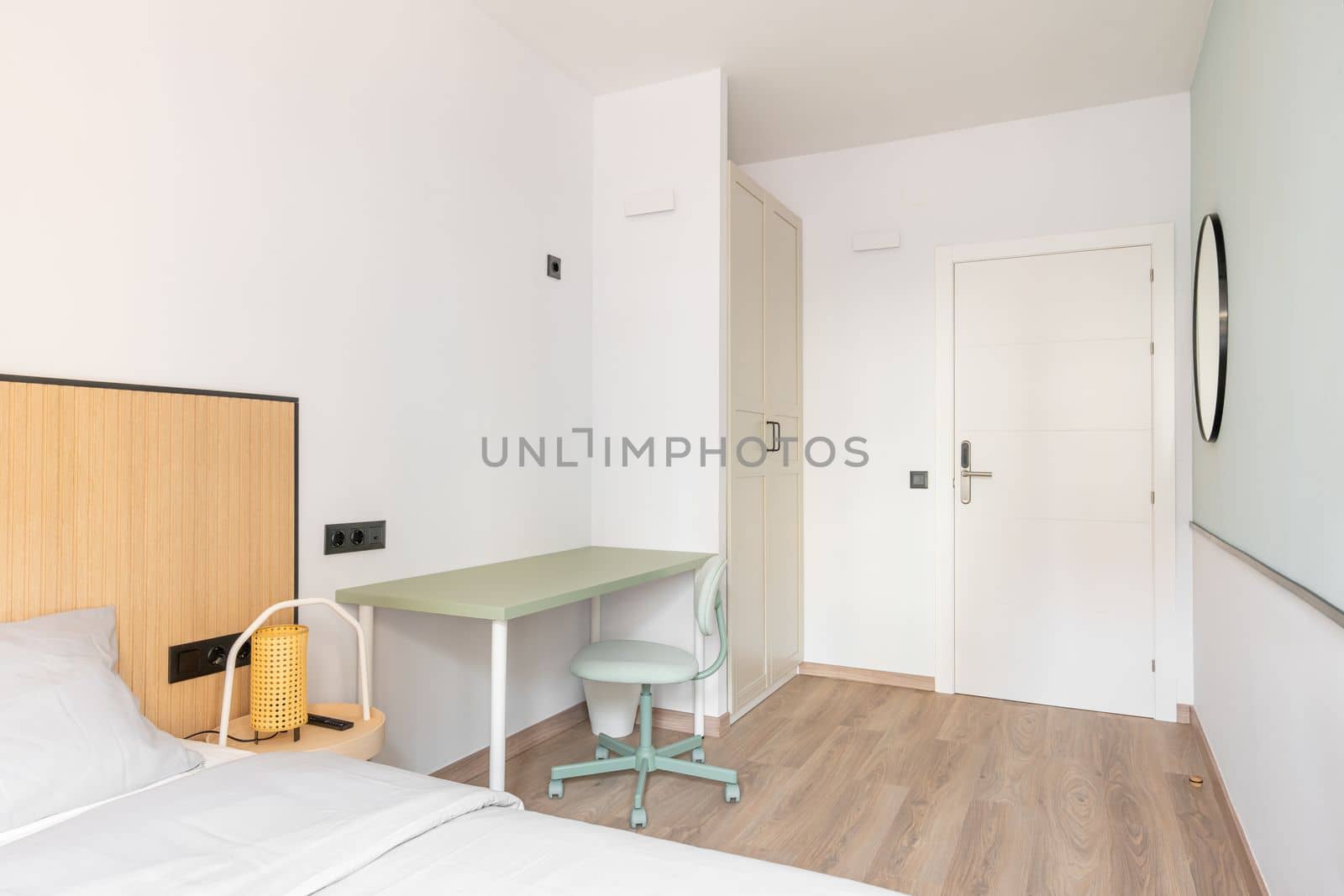 Brightly lit room with daylight bright light. Room for extended stay. Wardrobe for clothes, table and chair for working space, bed for sound sleep. Entrance door with electronic lock. by apavlin