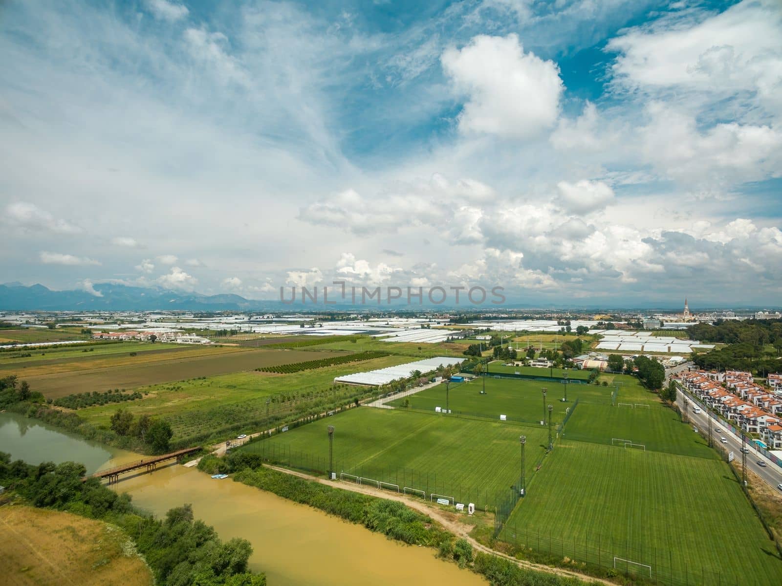 Aerial photo of football fields on cloudy day