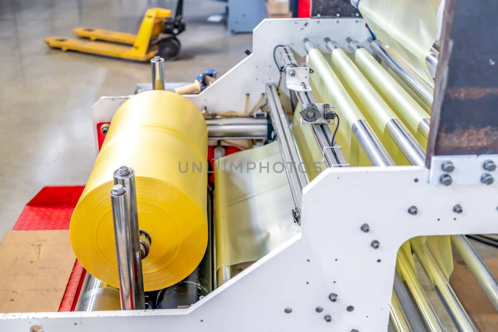 large plastic roll in the factory for the production of plastic packaging material and bags. 