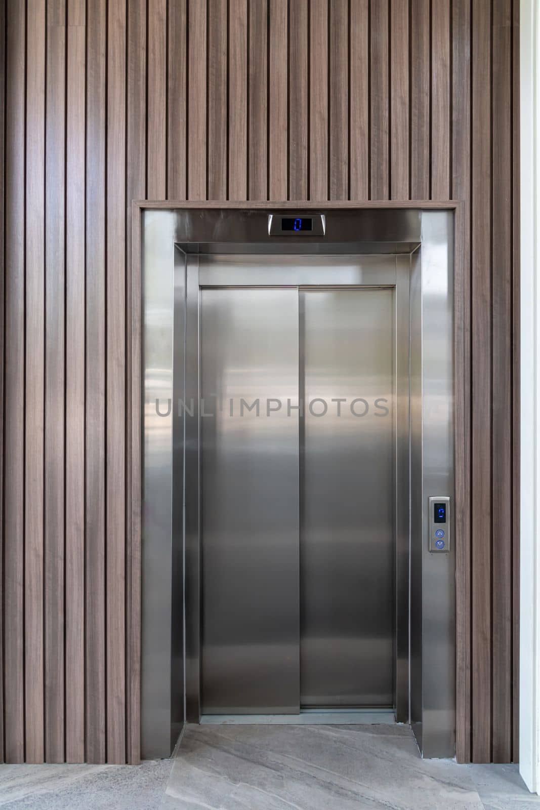 Modern elevator door standing on the ground floor of the business center