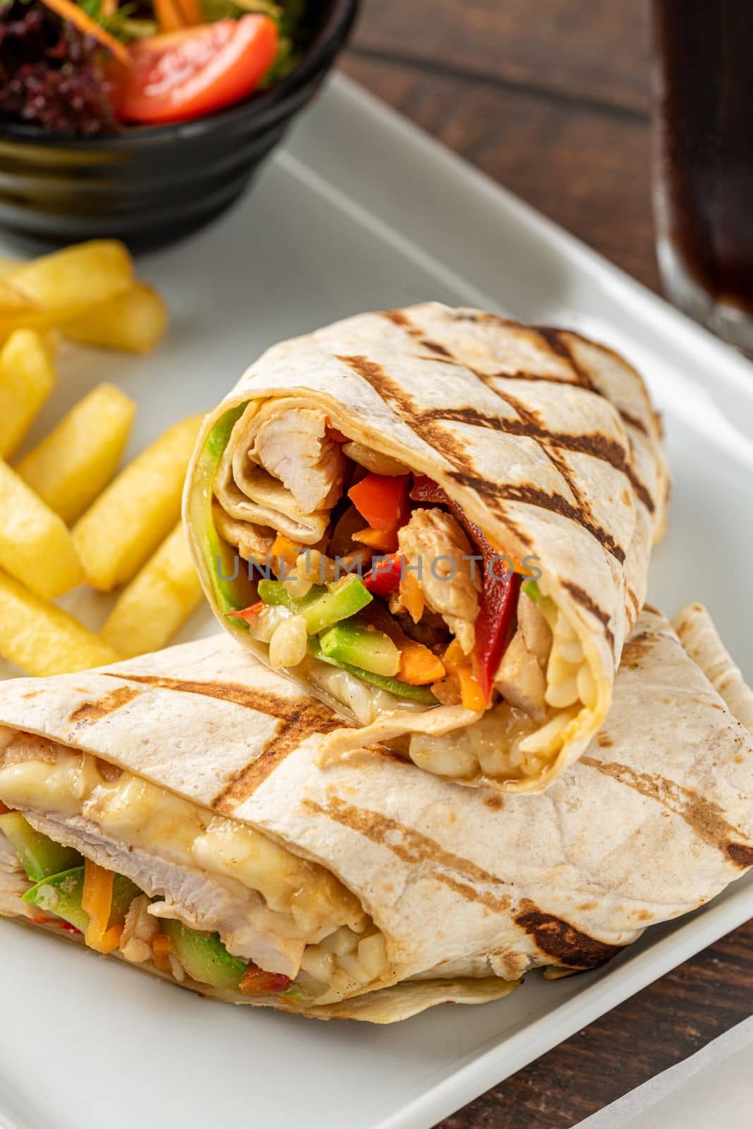 Chicken veggie wrap with french fries and salad by Sonat