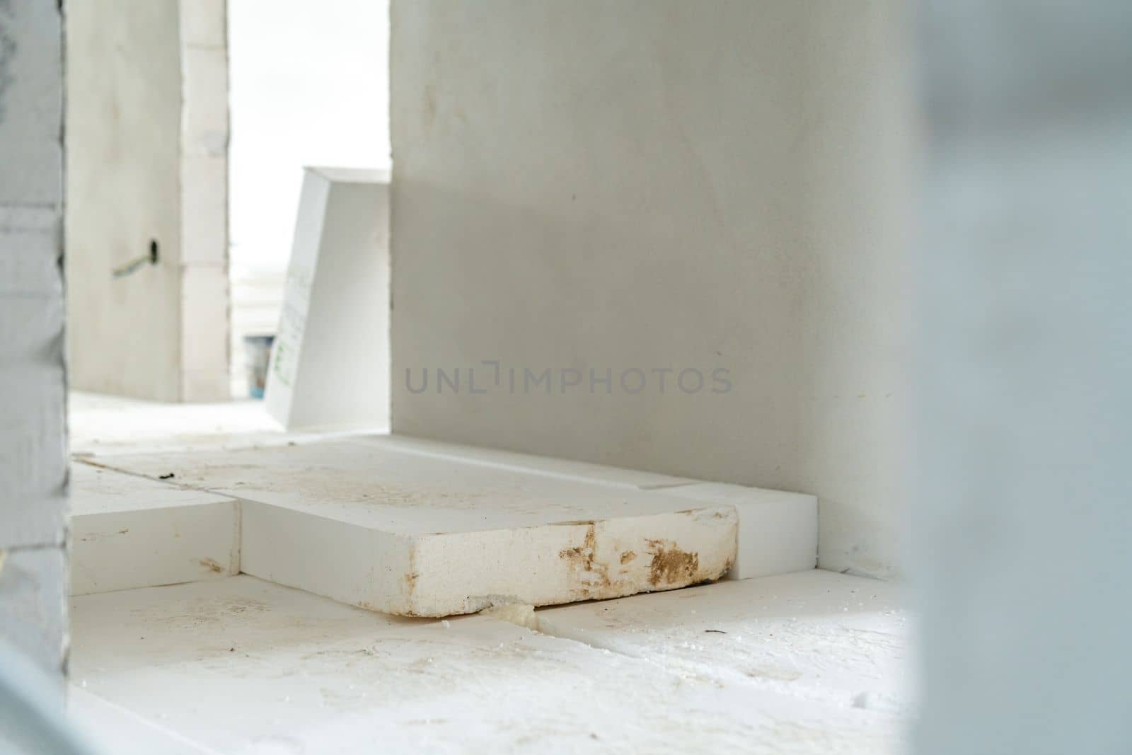 insulation of floors with polystyrene on the construction site. High quality photo