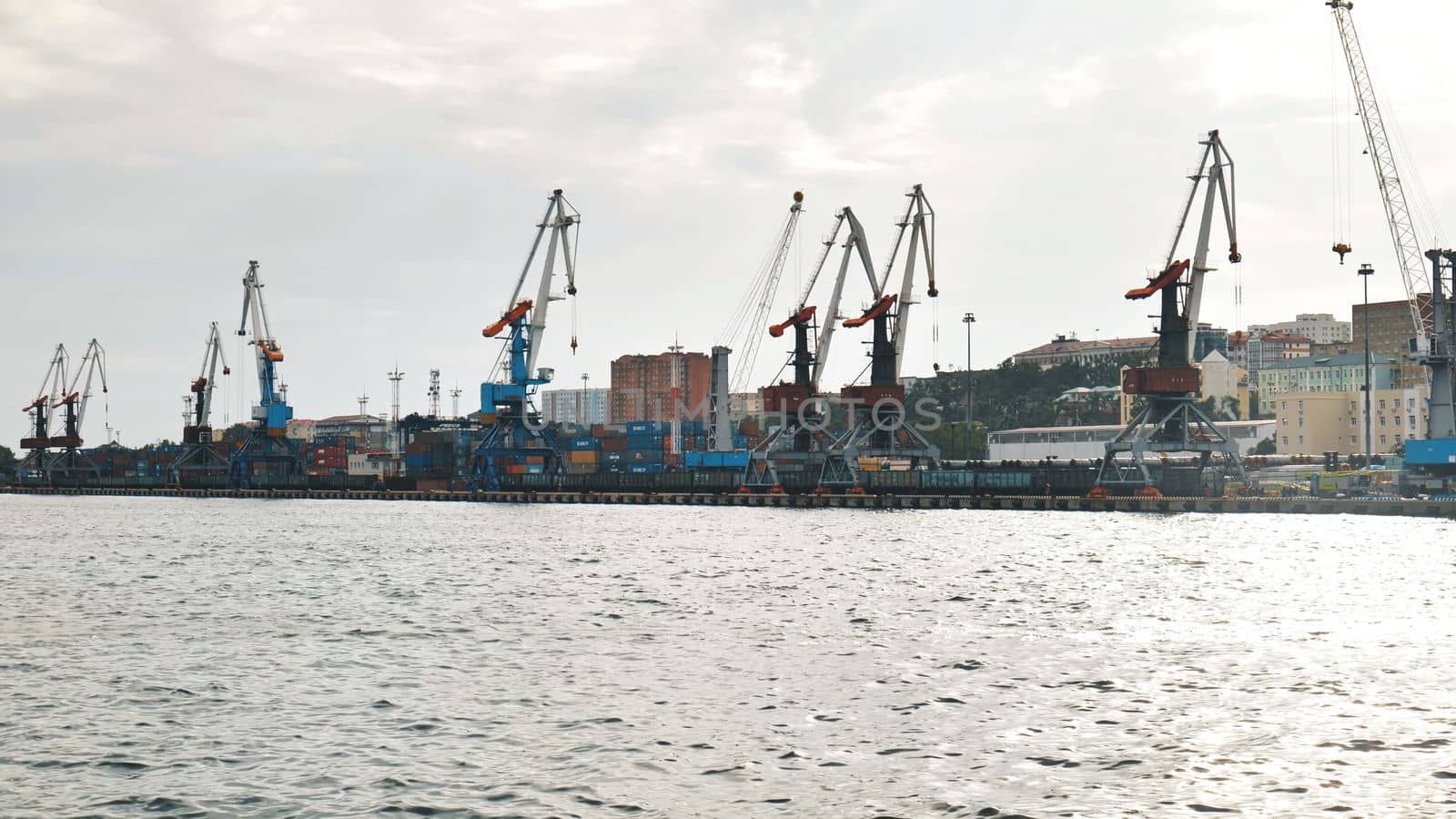 The seaport of Vladivostok with cranes. View from the ferry