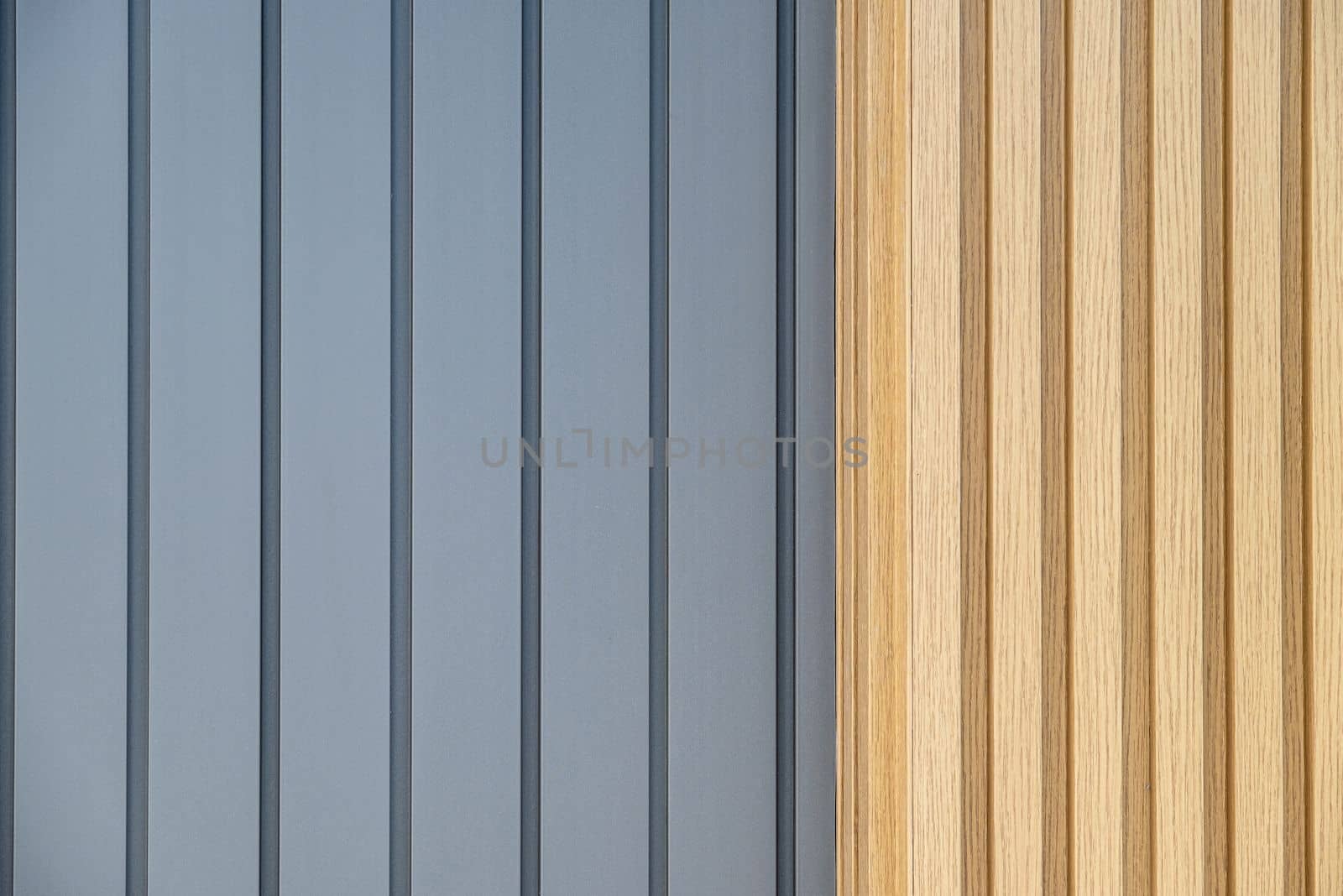 Wooden textured and anthracite gray vinyl coated exterior insulation board on PVC panel