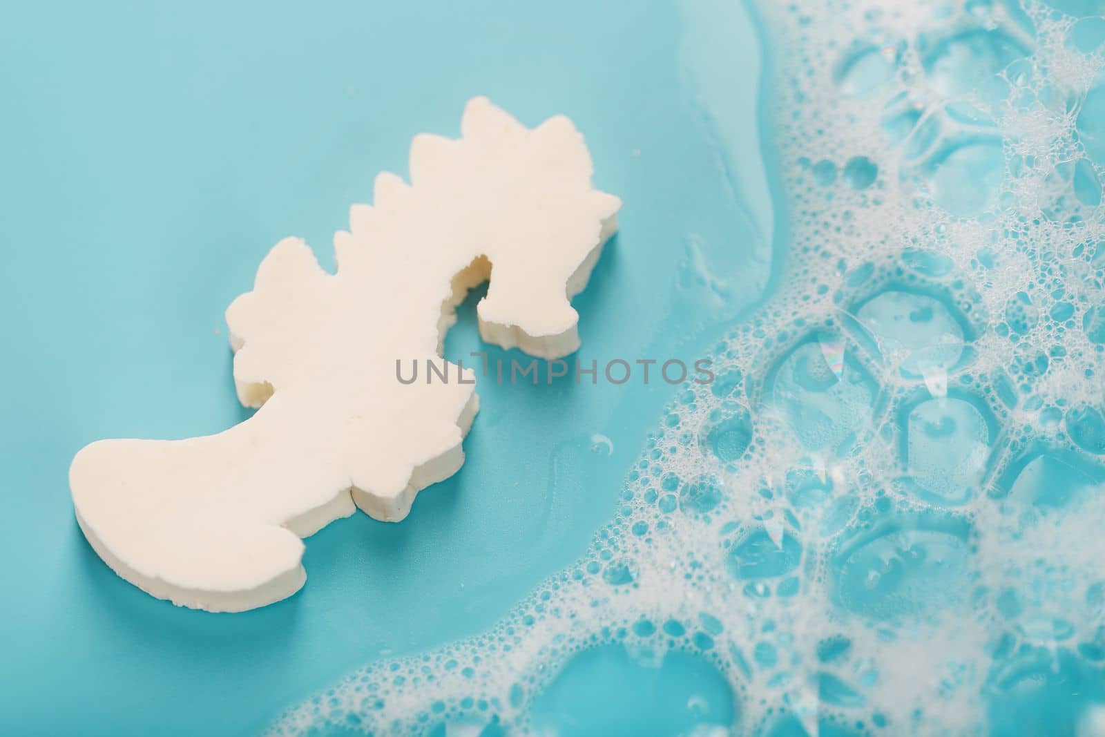White soap in the shape of a seahorse with foam by AlexGrec
