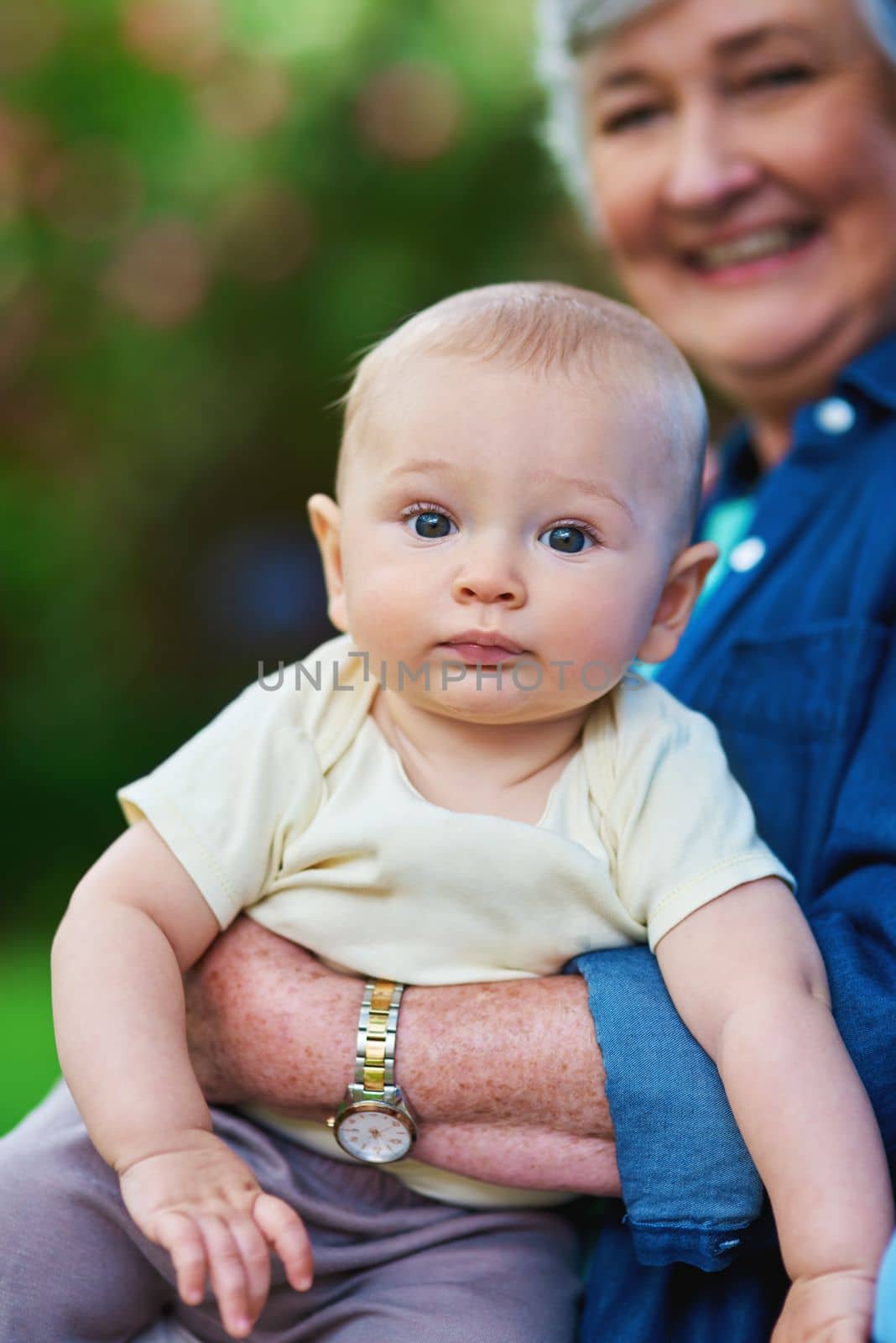 Its grandma time. a baby boy spending time outdoors with his grandmother