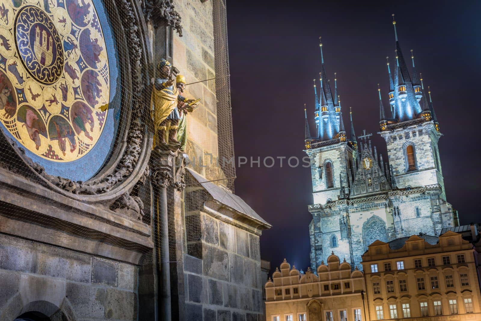 Astronomical clock, Tyn church and old town hall tower in Prague at dawn, Czech republic