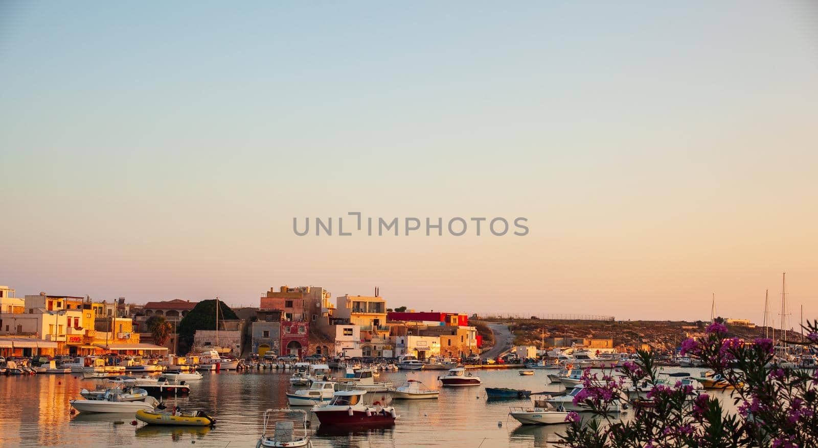 LAMPEDUSA, ITALY - AUGUST, 01: View of the old town of Lampedusa at sunset on August 01, 2018