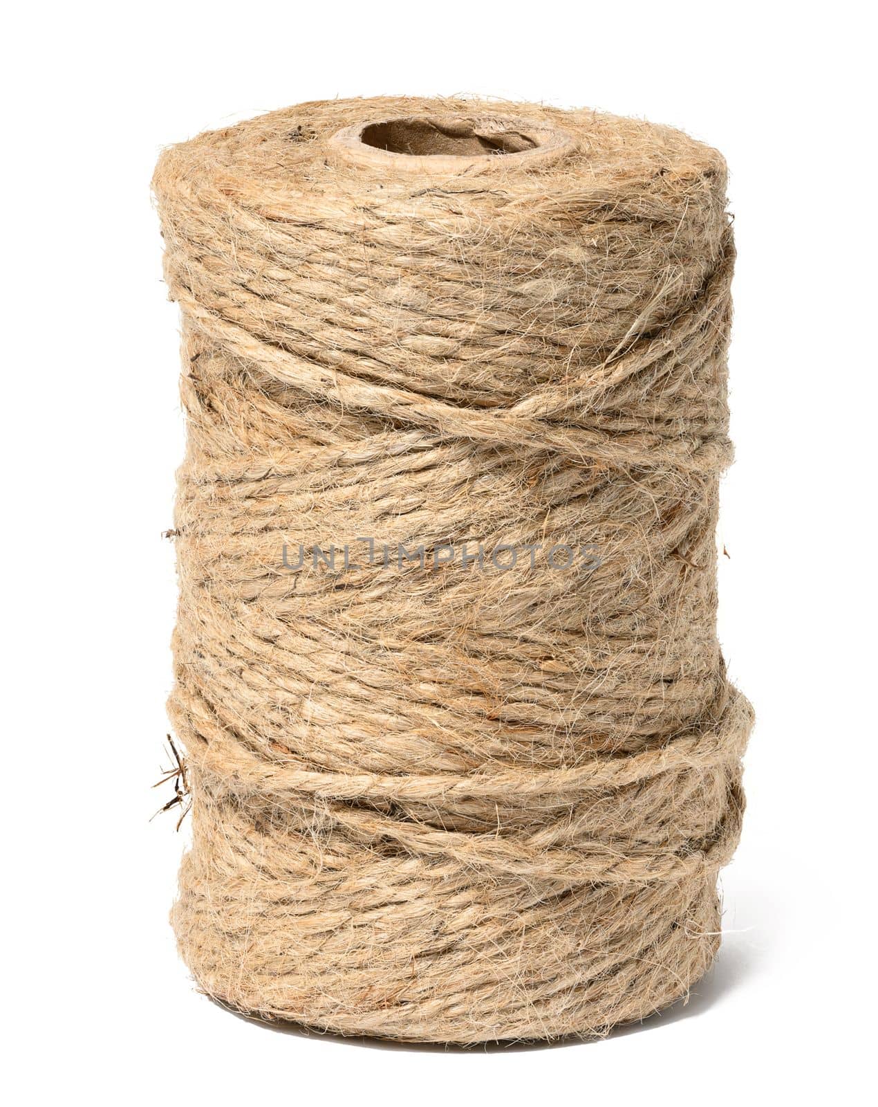 Brown thread spool on white isolated background, packaging rope by ndanko