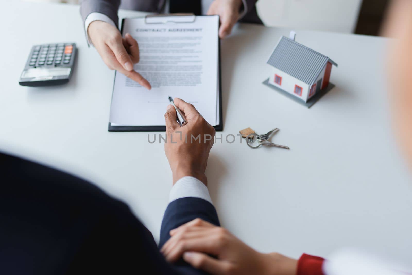 Real estate firms to buy homes and land are handing over keys and homes to couples after agreeing to sell the house and enter into a loan agreement