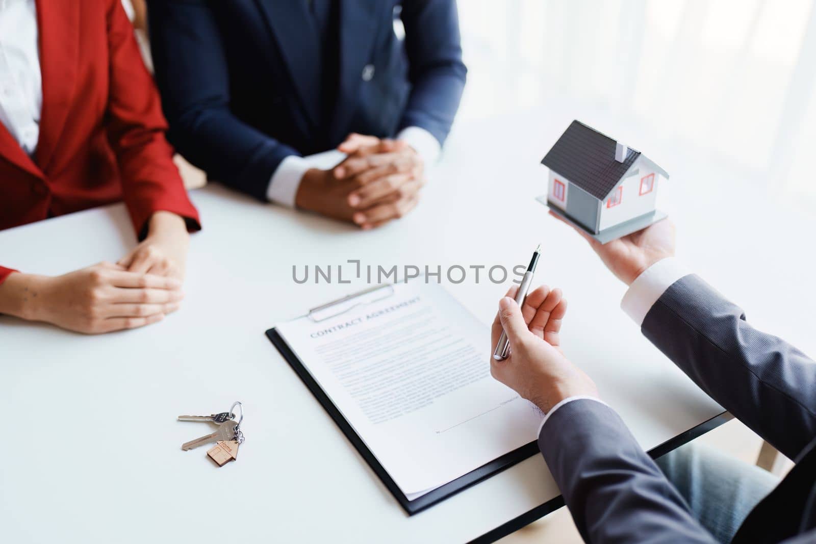 Real estate firms to buy homes and land are handing over keys and homes to couples after agreeing to sell the house and enter into a loan agreement