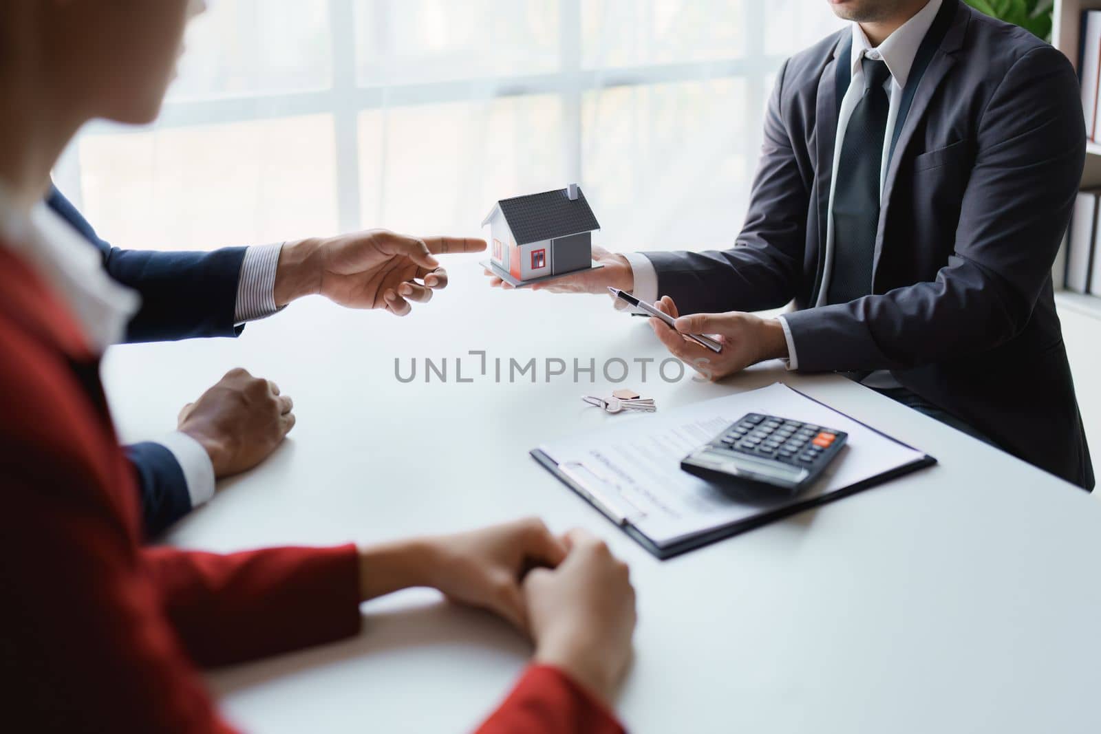 Real estate firms to buy homes and land are handing over keys and homes to couples after agreeing to sell the house and enter into a loan agreement