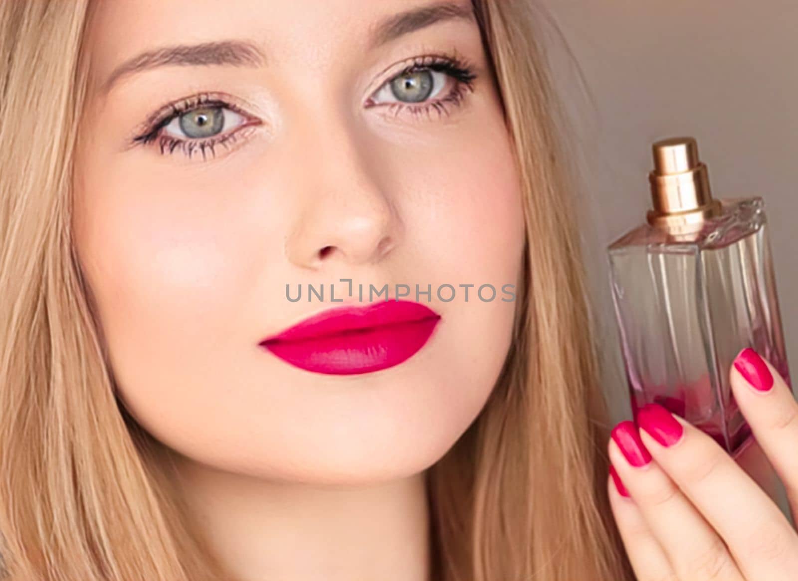 Beauty product, perfume and cosmetics, face portrait of beautiful woman with perfume or fragrance bottle of floral scent for luxury cosmetic, glamour and fashion.