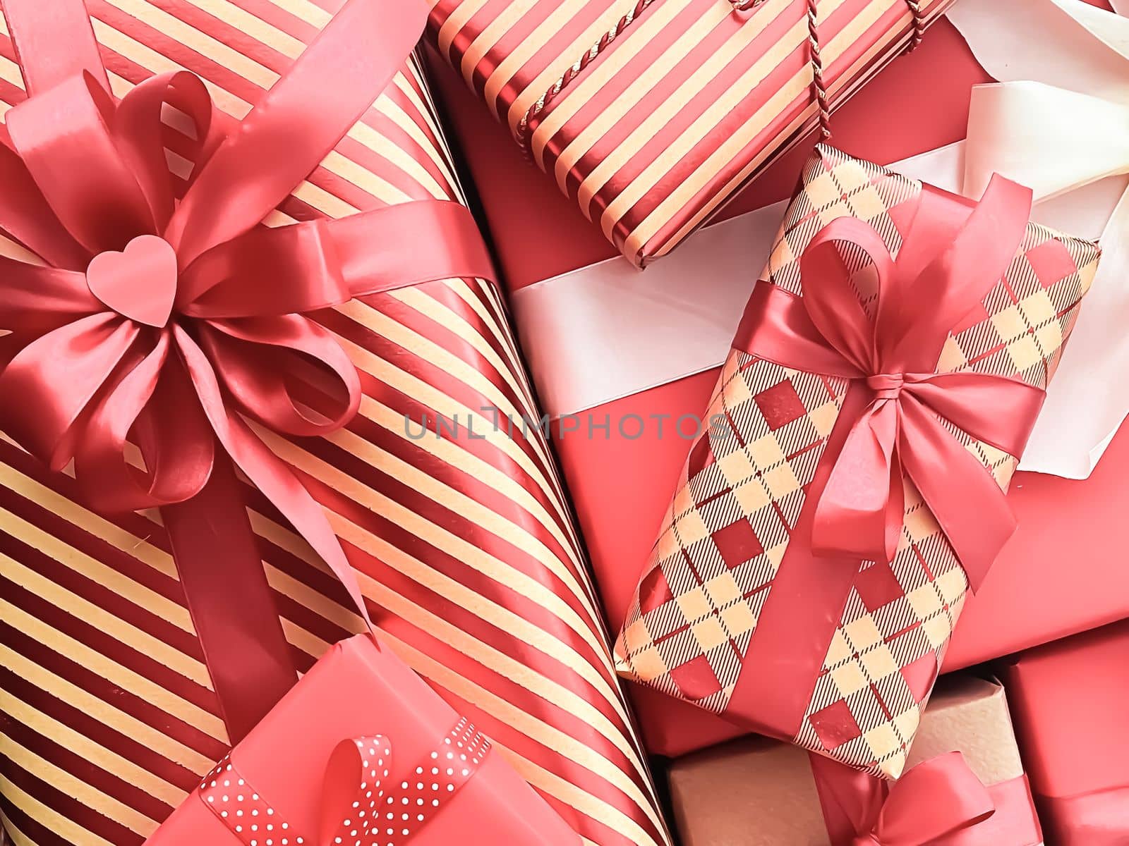 Holiday gifts and wrapped luxury presents, coral gift boxes as surprise present for birthday, Christmas, New Year, Valentines Day, boxing day, wedding and holidays shopping or beauty box delivery concept