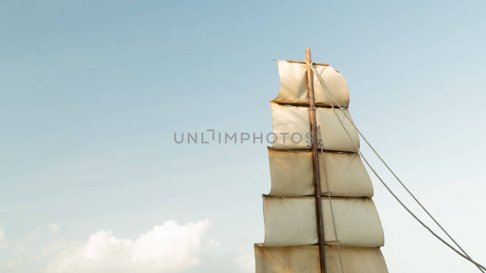 Tiered sail against the sky space for text by voktybre