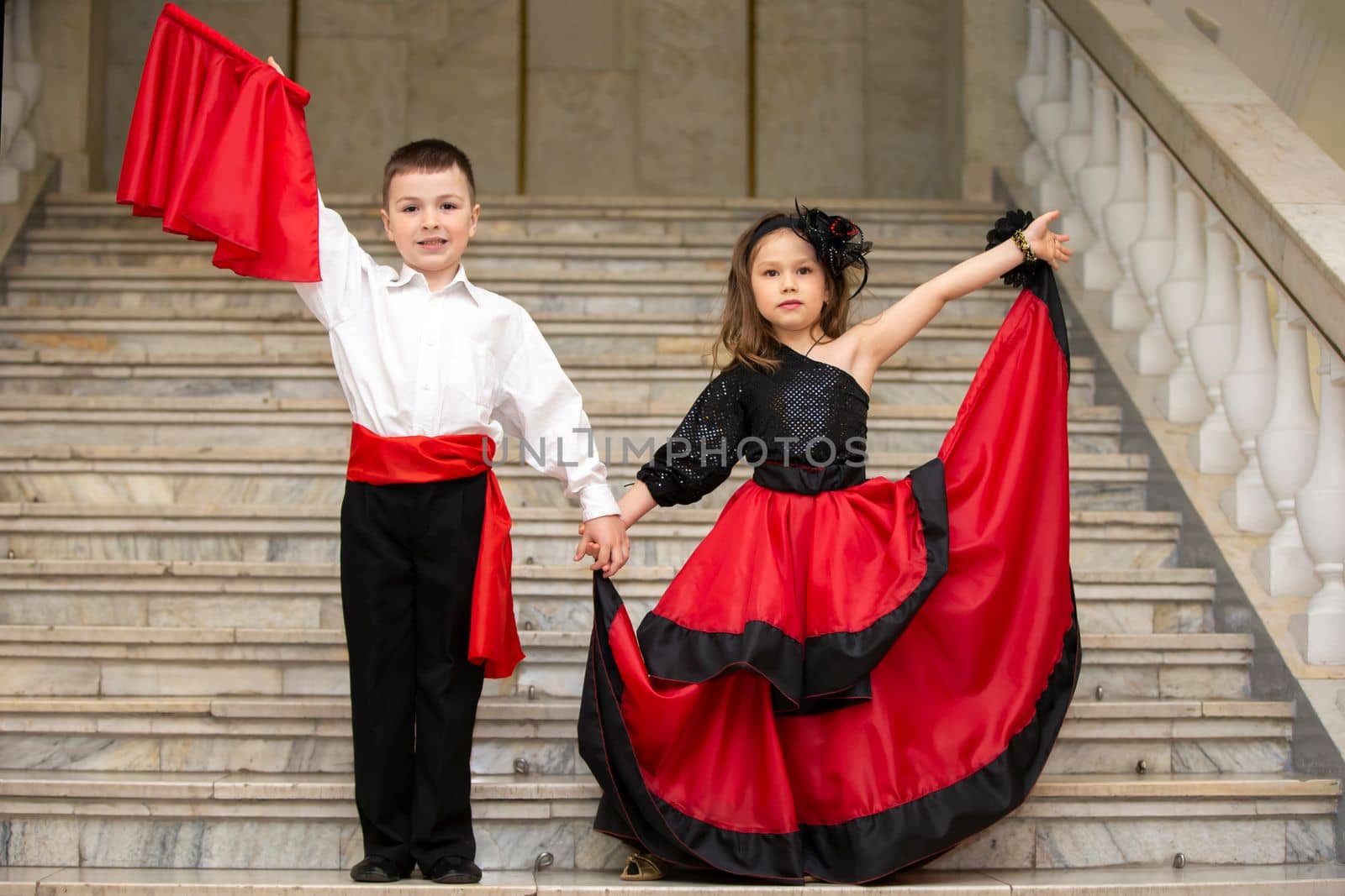 Belarus, city of Gomel, May 21, 2021 Children's holiday in the city. Boy and girl in national Spanish clothes.