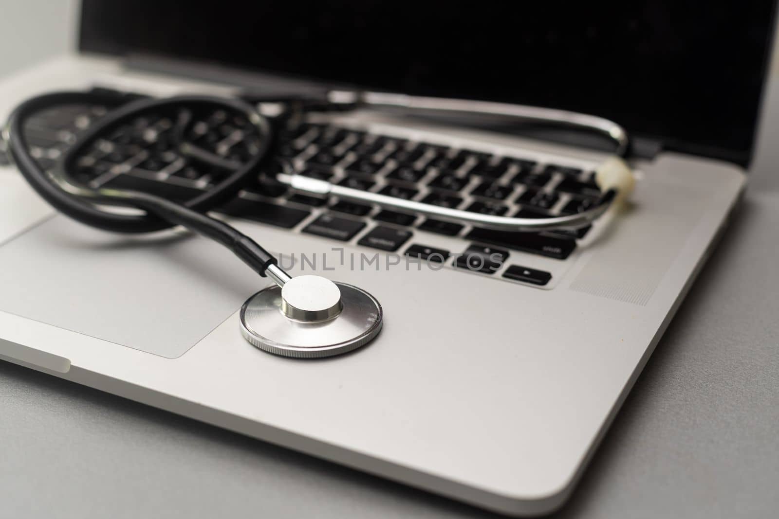 Stethoscope on a computer keyboard by Andelov13