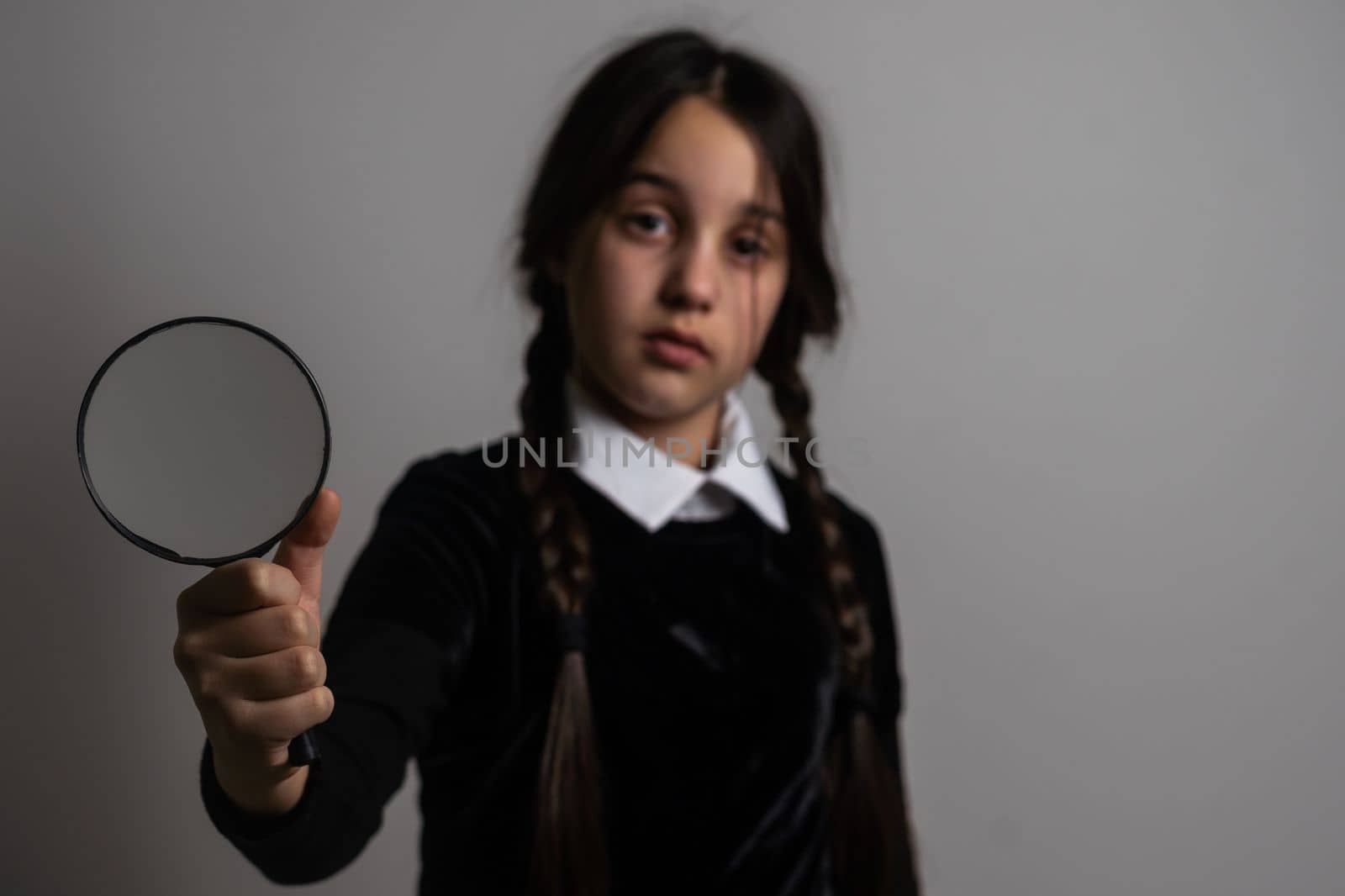 Wednesday student girl on a dark background