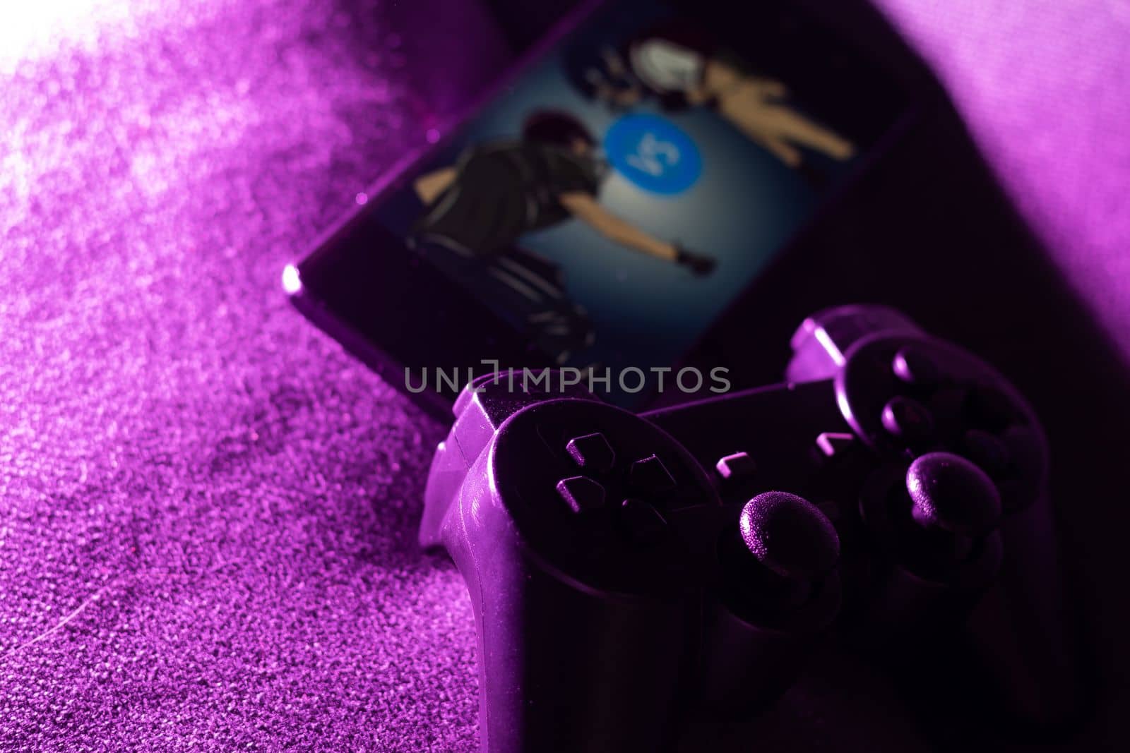 Smartphone and two game joysticks. Minimalism. Cybersport concept. Streaming. by Andelov13