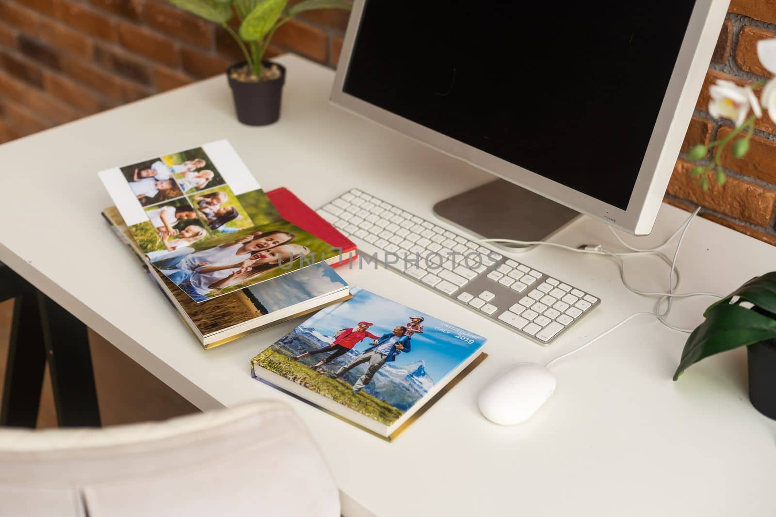 Family photos archive saved in brightly designed photo book, bright summer memories placed in the photobook by Andelov13