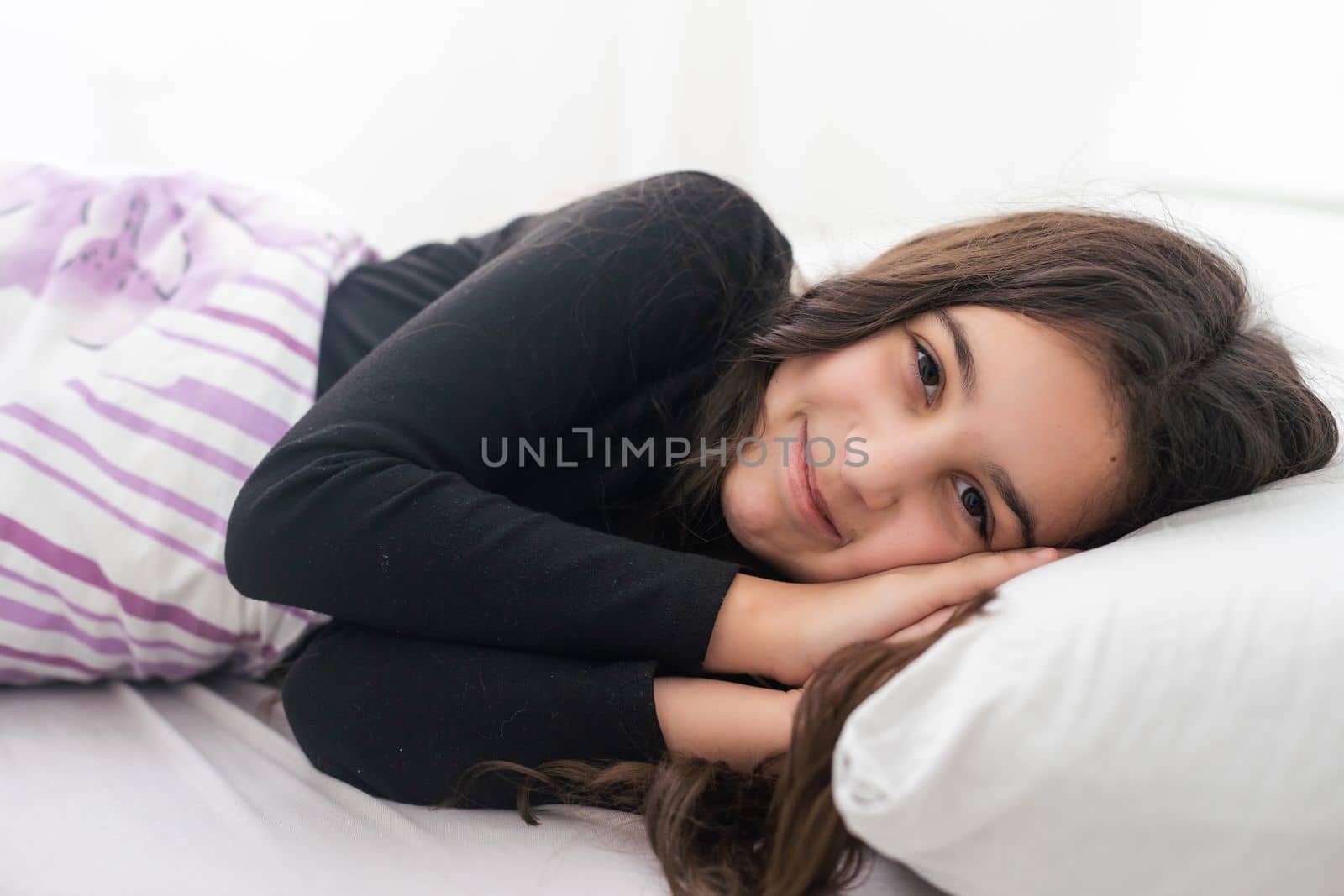 teenage girl in bed. resting, good night sleep concept