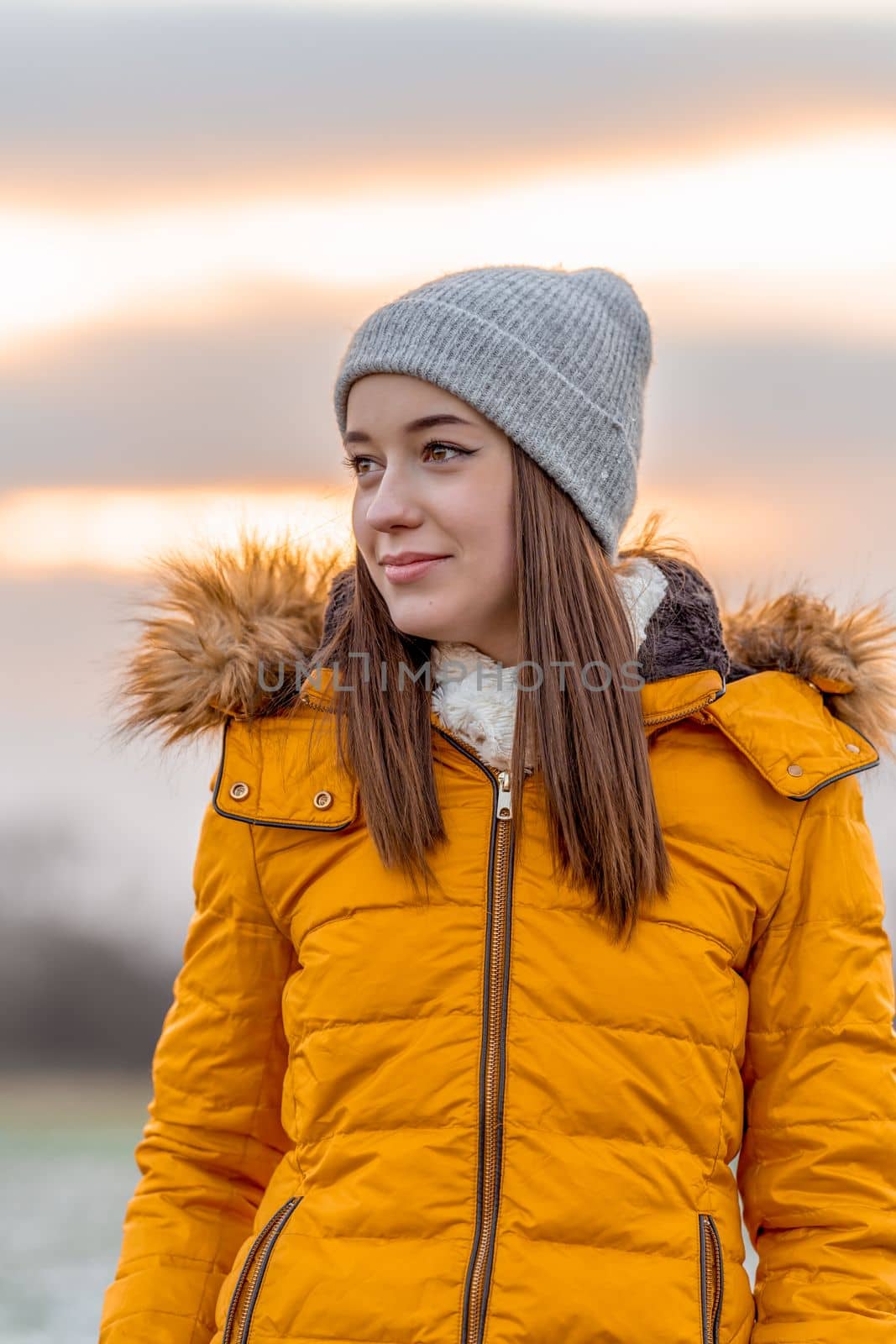 portrait of a beautiful teenage girl at sunset. High quality photo