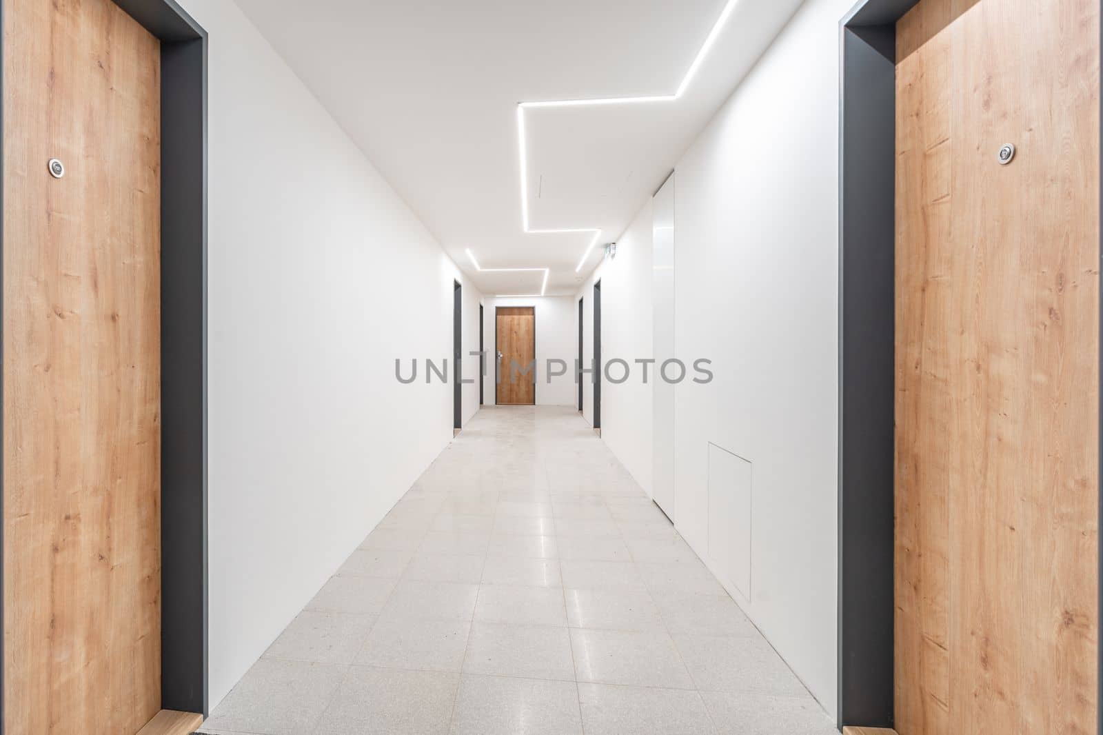 corridor with entrances to the apartment in the apartment building. High quality photo