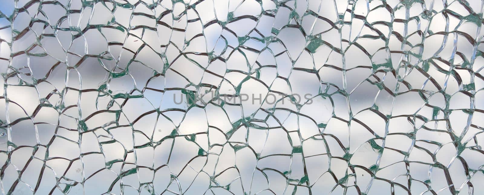 Useful texture overlay. A broken glass on. with many sharp shards. Useful texture overlay for background.