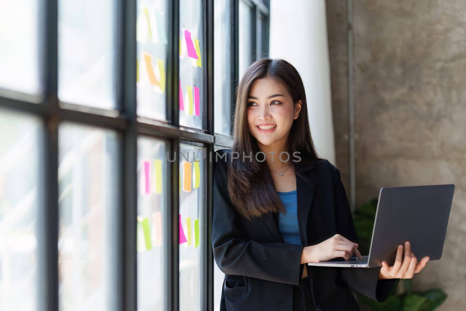 Portrait of Business woman analytic finance statistics and planning strategy by laptop. tax, report, accounting concept.