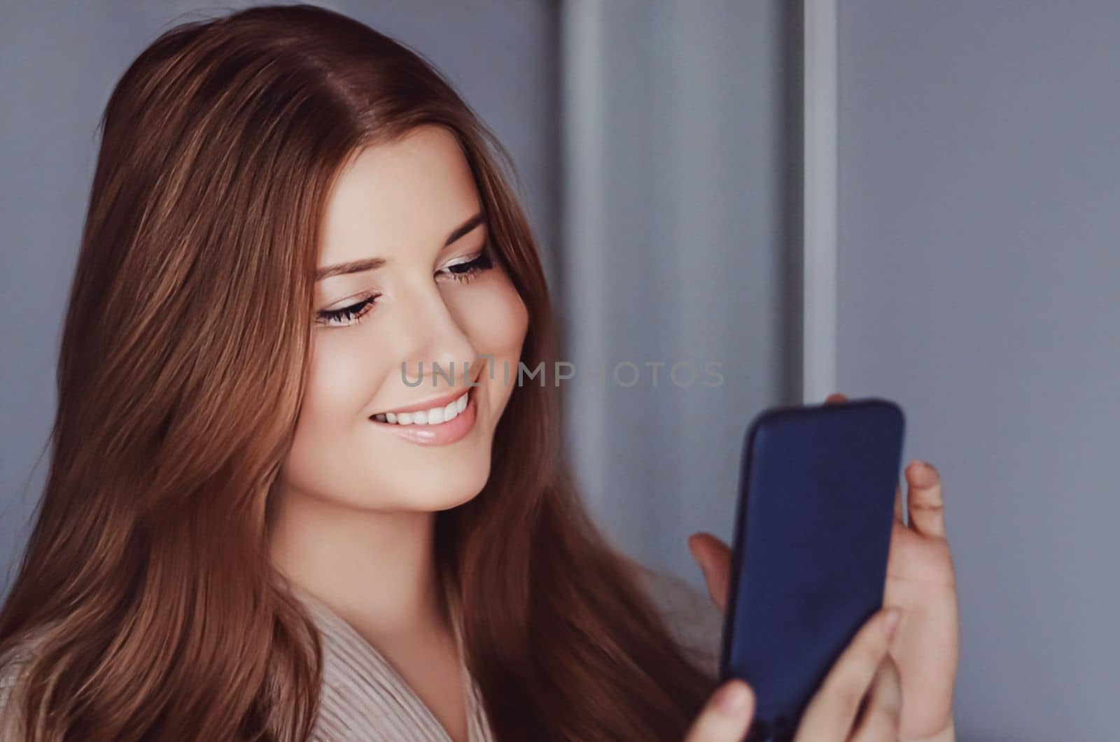 Beautiful woman having a video call and talking on mobile phone, girl doing online shopping on smartphone.