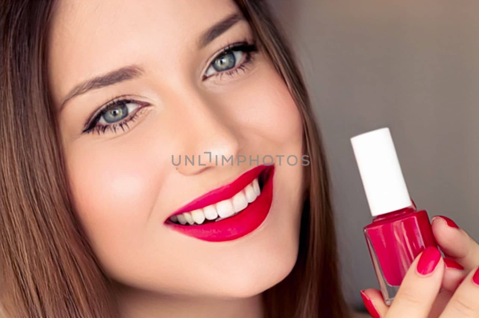 Beauty product, makeup and cosmetics, face portrait of beautiful woman with nail polish, manicure and matching red lipstick make-up for luxury cosmetic, style and fashion.