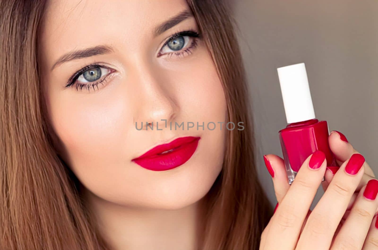 Beauty product, makeup and cosmetics, face portrait of beautiful woman with nail polish, manicure and matching red lipstick make-up for luxury cosmetic, style and fashion by Anneleven