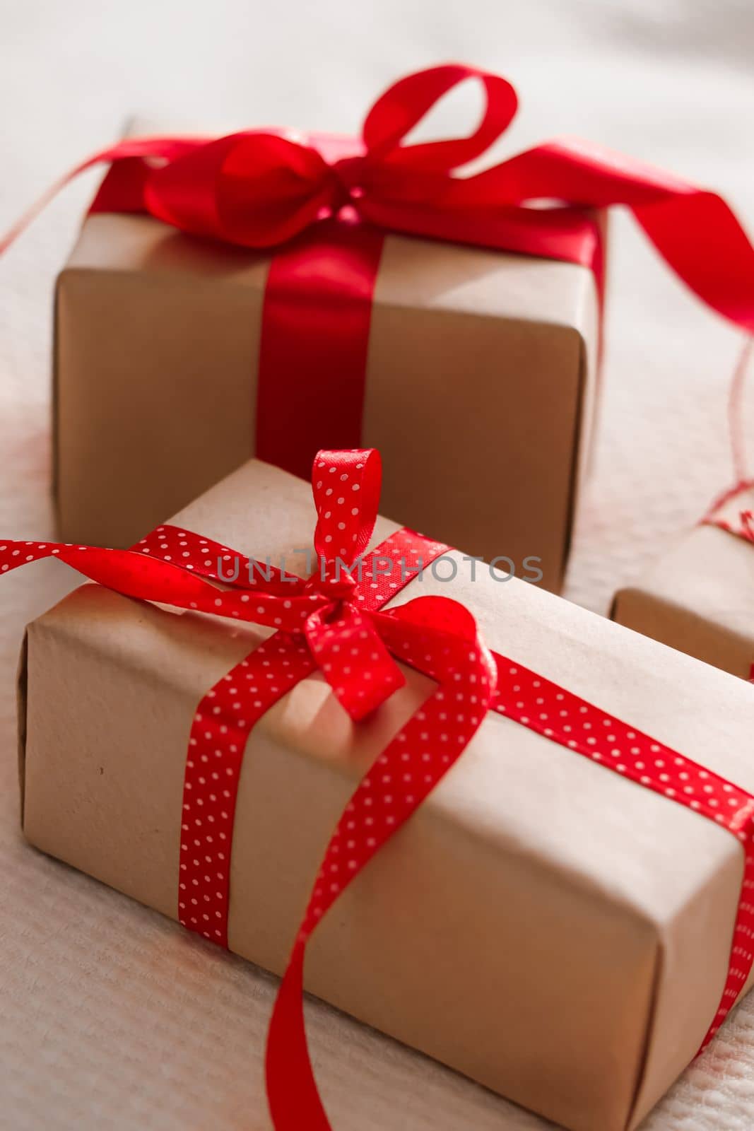 Valentines Day, birthday and holidays, gifts and presents with red ribbons.