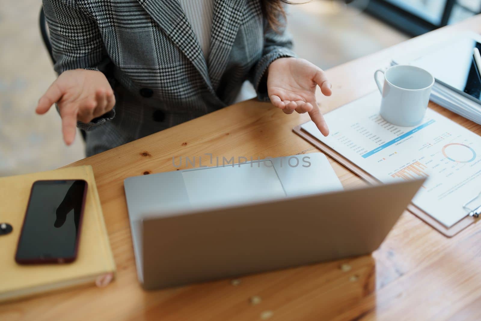Business work and planning, portrait of a businesswoman using a computer in a meeting by Manastrong