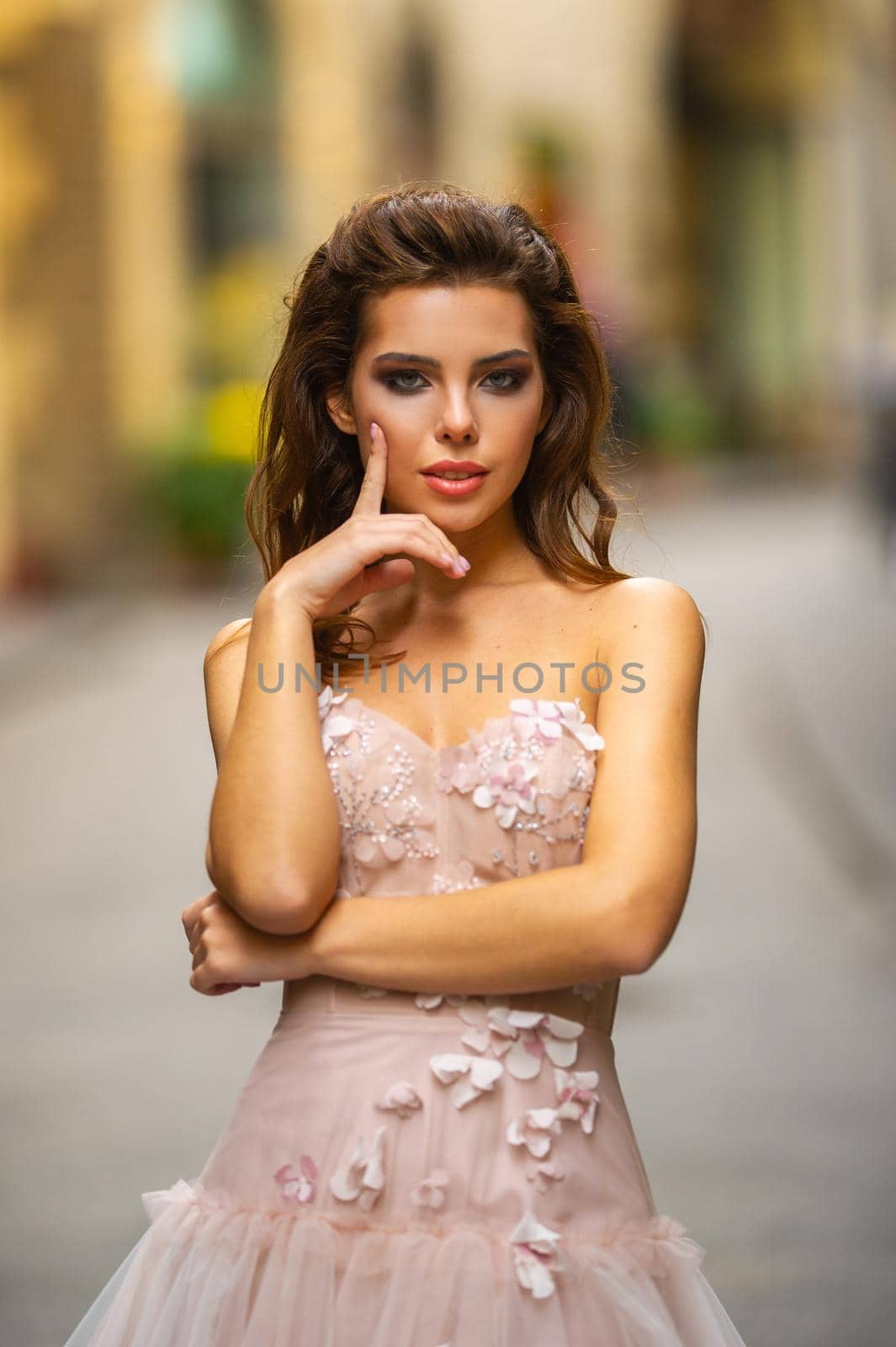 A bride in a pink wedding dress walks in Florence, Italy by Lobachad