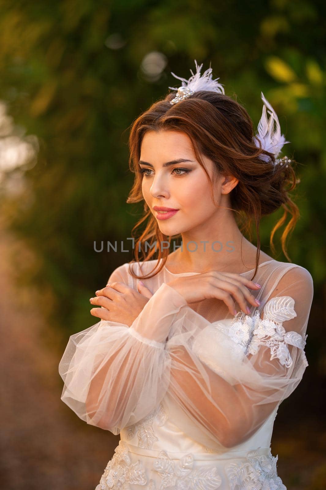 Stylish young bride on her wedding day in Italy.elegant Bride from Tuscany.Bride in a white wedding dress.