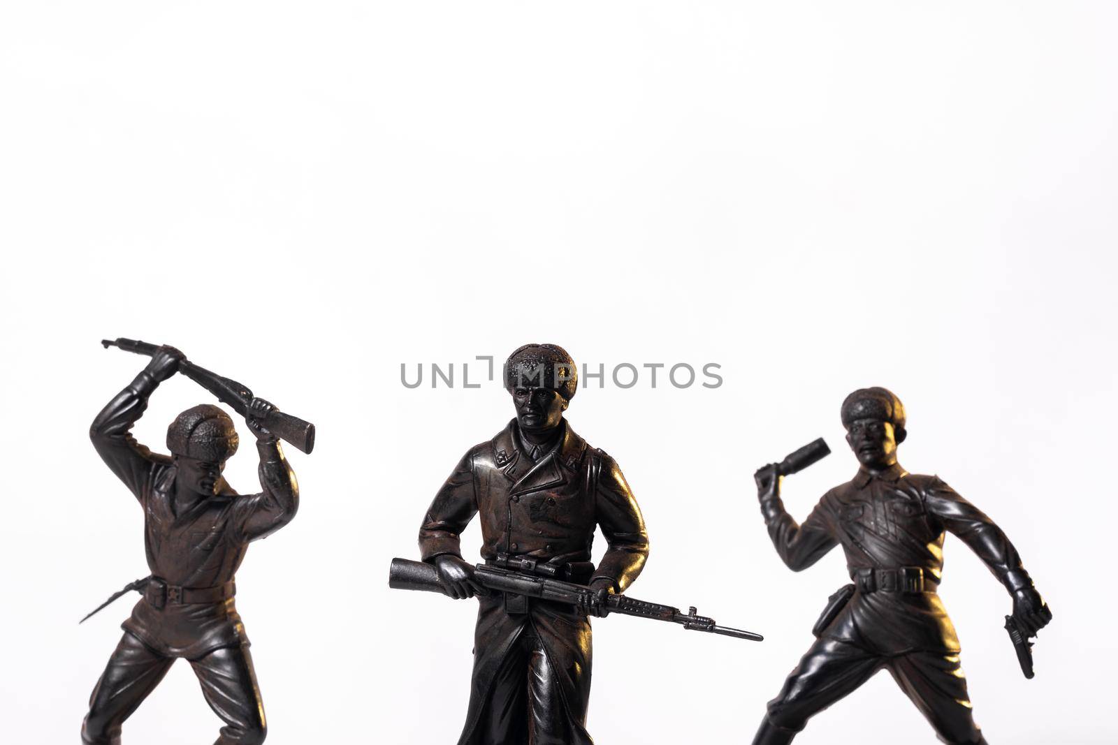 Vintage toy black soldiers isolated on white background.